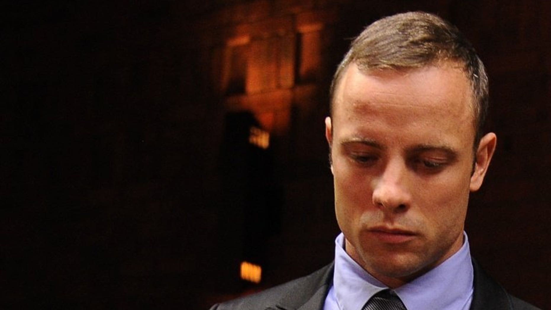 South African Olympic sprinter Oscar Pistorius appears at the Magistrate Court in Pretoria on February 21, 2013. Prosecutors said they have finalised their case against Pistorius, who is charged with the Valentine's Day murder of his girlfriend.