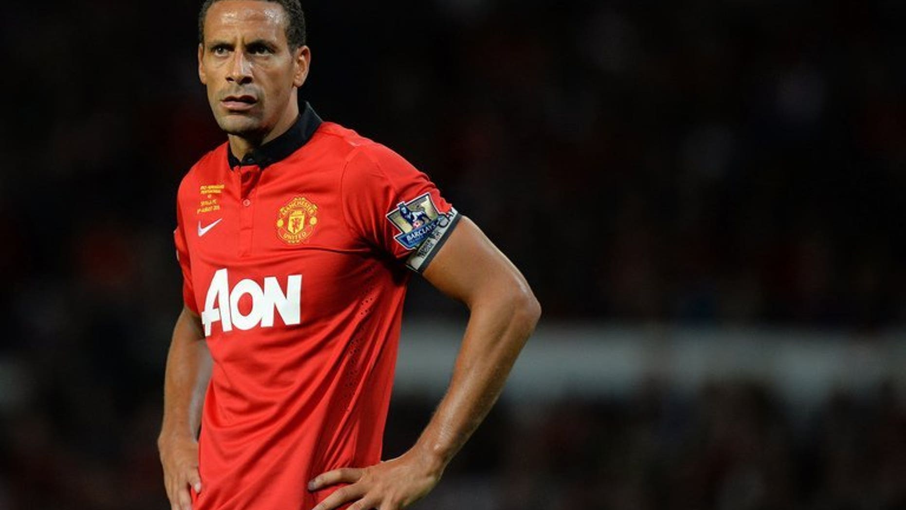 Manchester United's English defender Rio Ferdinand pictured during his testimonial match against Sevilla at Old Trafford in Manchester, northwest England on August 9, 2013. Ferdinand claims that the current national side have lost their identity and has called for an overhaul of the national coaching strategy.