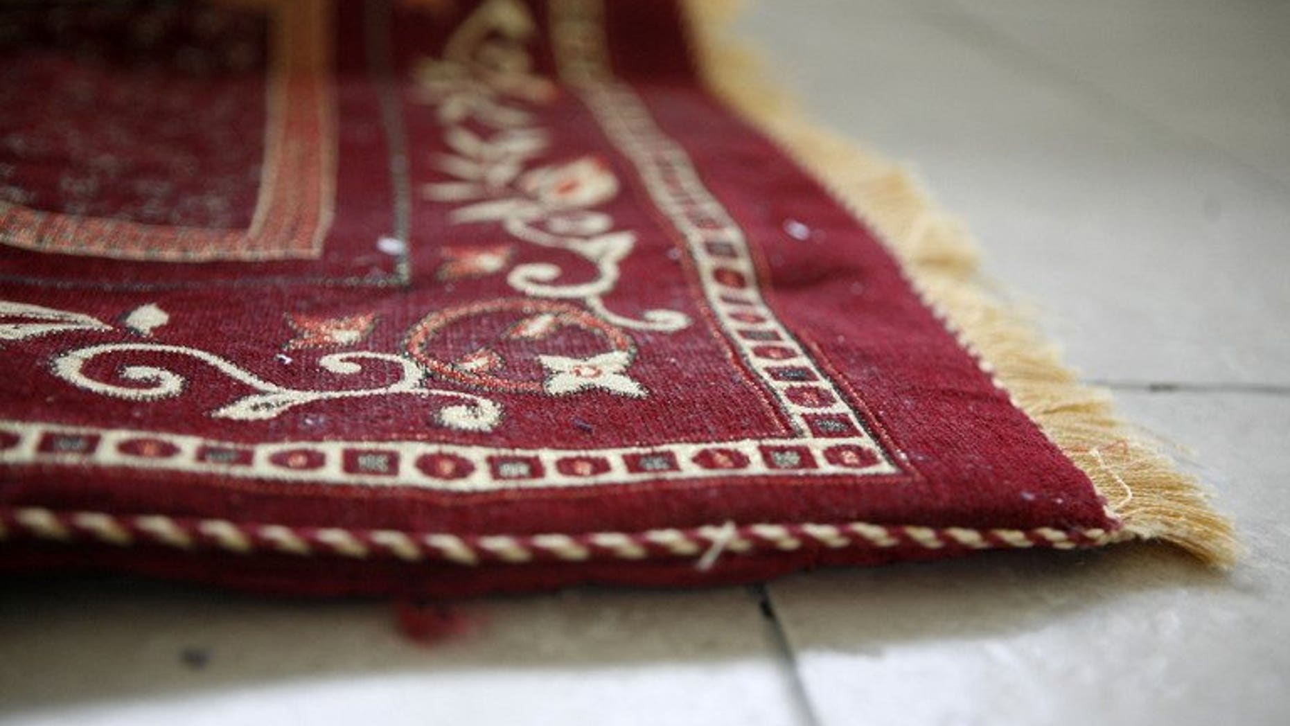 A prayer rug pictured on November 12, 2009 in Killeen, Texas. Malaysian police said Tuesday they have arrested a resort owner after he allowed Buddhists to use a Muslim prayer room in the country's latest religious controversy.