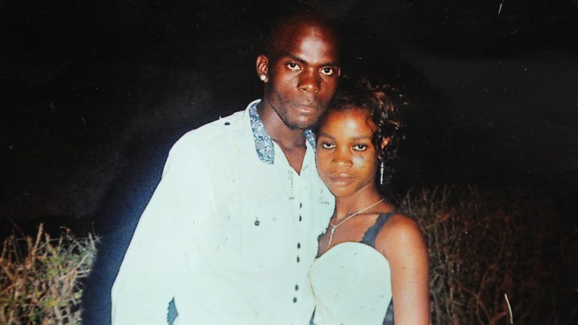 A file photo of Mozambican taxi driver Mido Macia with his sister Melida Macia. A South African court has freed on bail nine policemen accused of murdering Macia who was dragged behind a police van and then brutally beaten to death.