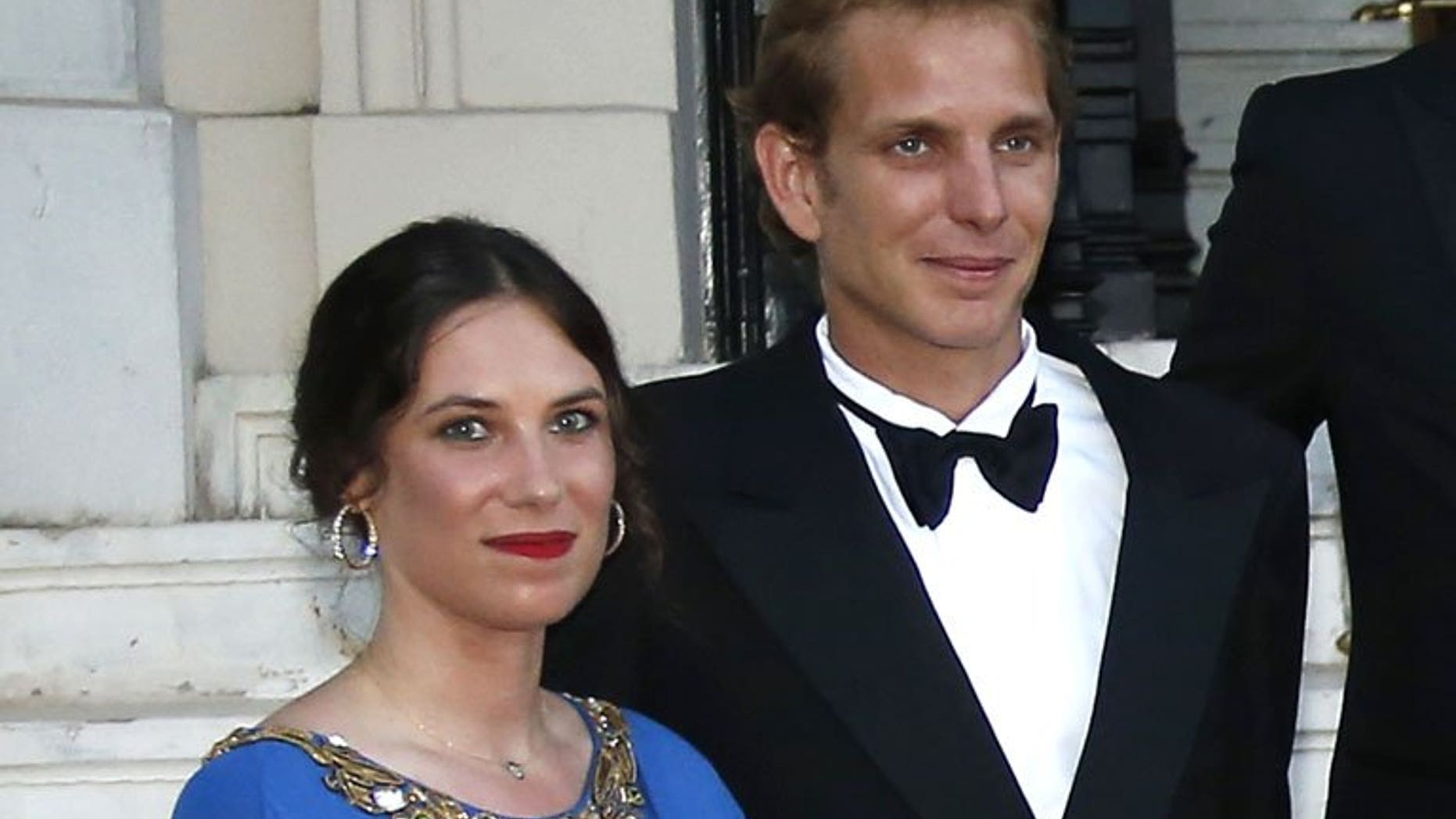 Andrea Casiraghi, the son of Princess Caroline of Hanover, and his partner Tatiana Santo Domingo as they arrive to attend the "Love Ball" in Monaco on July 27, 2013. Casiraghi, eldest son of Princess Caroline of Monaco, is to marry his Colombian girlfriend on August 31.