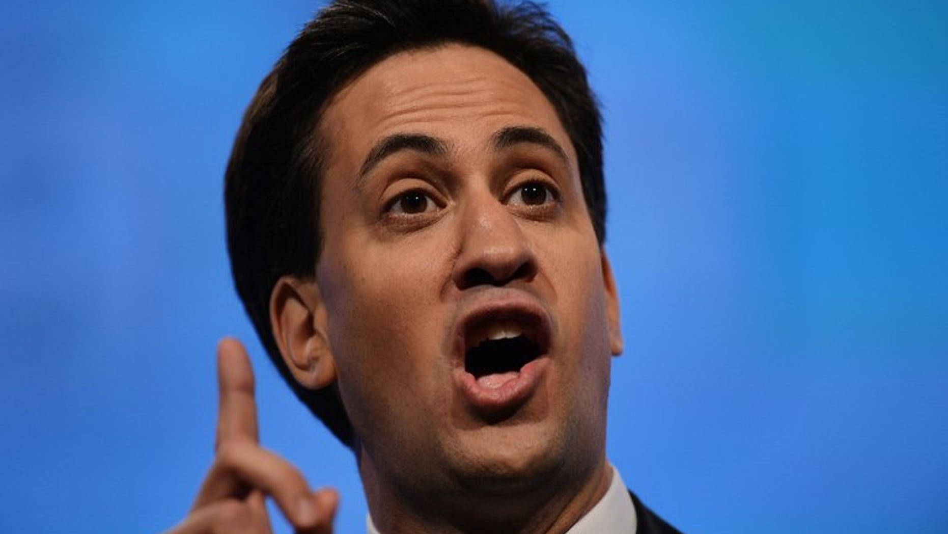 Labour leader Ed Miliband delivers his keynote speech at the annual Labour Party Conference in Manchester on October 2, 2012. Miliband got pelted with eggs during a walkabout in south London.