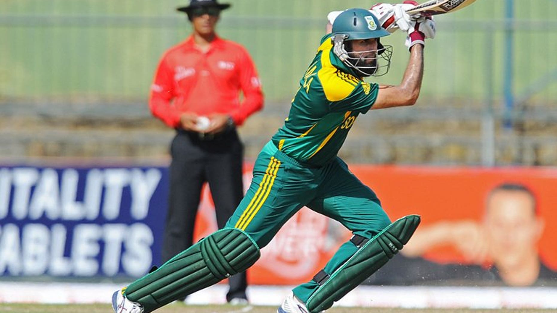 South African cricketer Hashim Amla plays a shot during the fourth One Day International with Sri Lankam July 28, 2013. Amla has joined Surrey until the end of the season, the English county side announced on Wednesday.