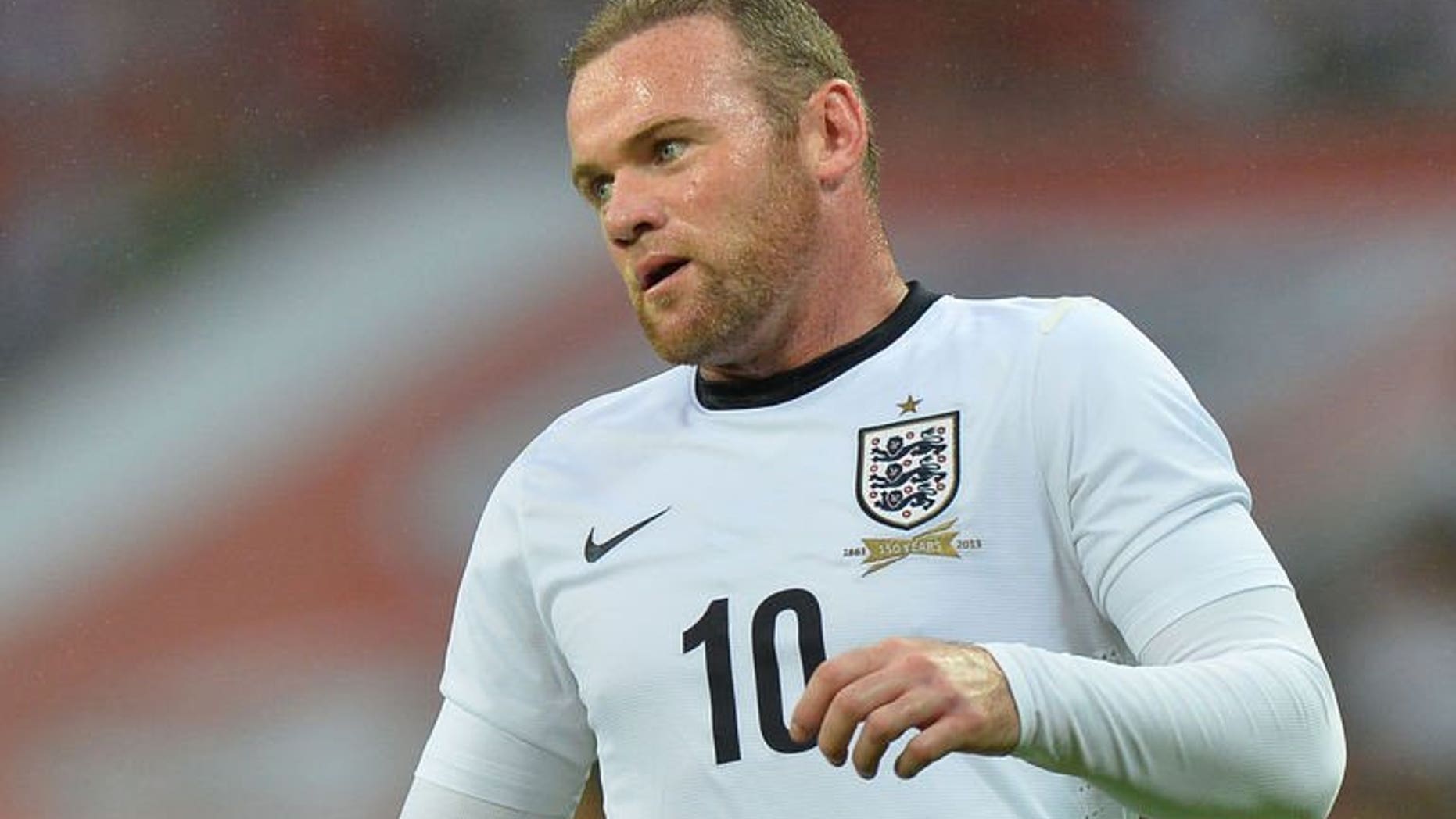 England striker Wayne Rooney plays during the international friendly football match between England and Scotland at Wembley Stadium in London on August 14, 2013. Rooney finally got the chance to prove his fitness as the unsettled Manchester United striker played for 66 minutes of England's 3-2 win against Scotland at Wembley on Wednesday.