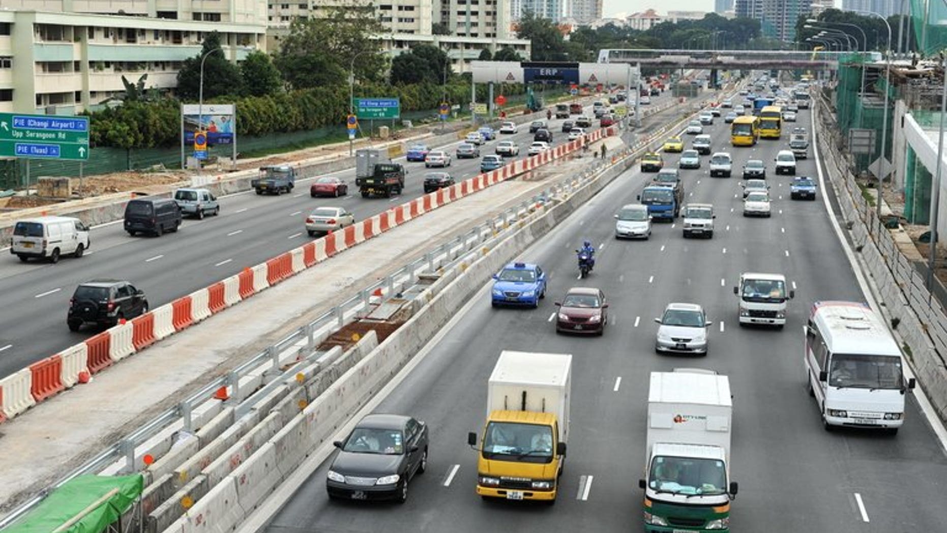File photo of traffic on a central expressway in Singapore. A Singapore bus driver has been fired after he was caught on video trimming his nails while driving along an expressway.