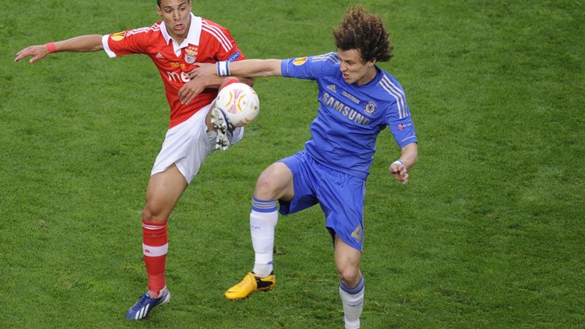 Benfica's Rodrigo (left) and Chelsea's defender David Luiz during the UEFA Europa League on May 15, 2013 in Amsterdam. Mourinho says there are no circumstances that would move the Premier League club to consider an offer for defender David Luiz.