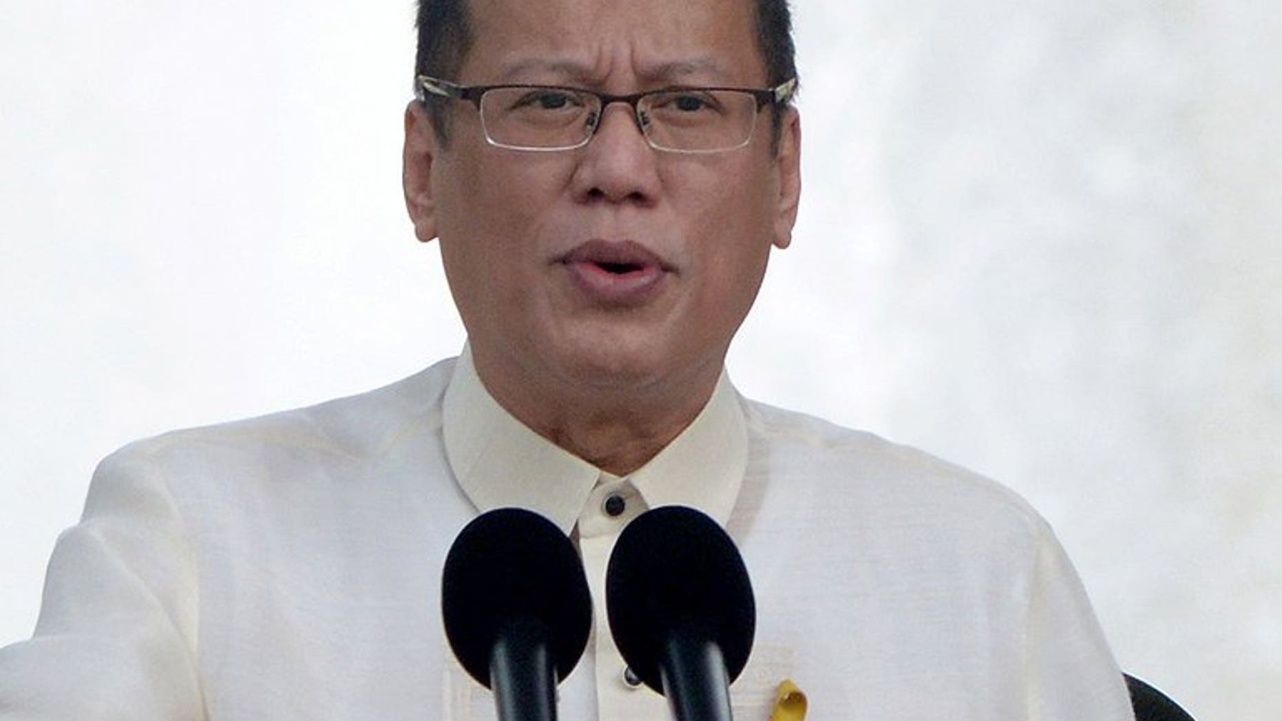 Philippine President Benigno Aquino addresses the crowd during a ceremony in Manila, on June 12, 2013. Aquino -- who previously survived a deadly assassination attempt during his struggle to the top of bare-knuckle Philippine politics -- has been laid low by his allergy to flowers.