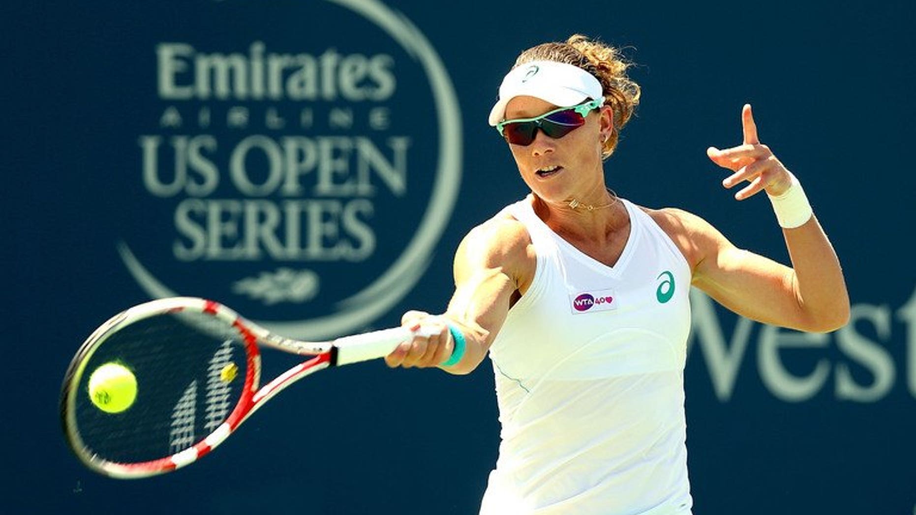 Samantha Stosur of Australia returns a shot to Jamie Hampton on August 14, 2013. The former US Open champion on Saturday said she had split with long-time coach David Taylor.