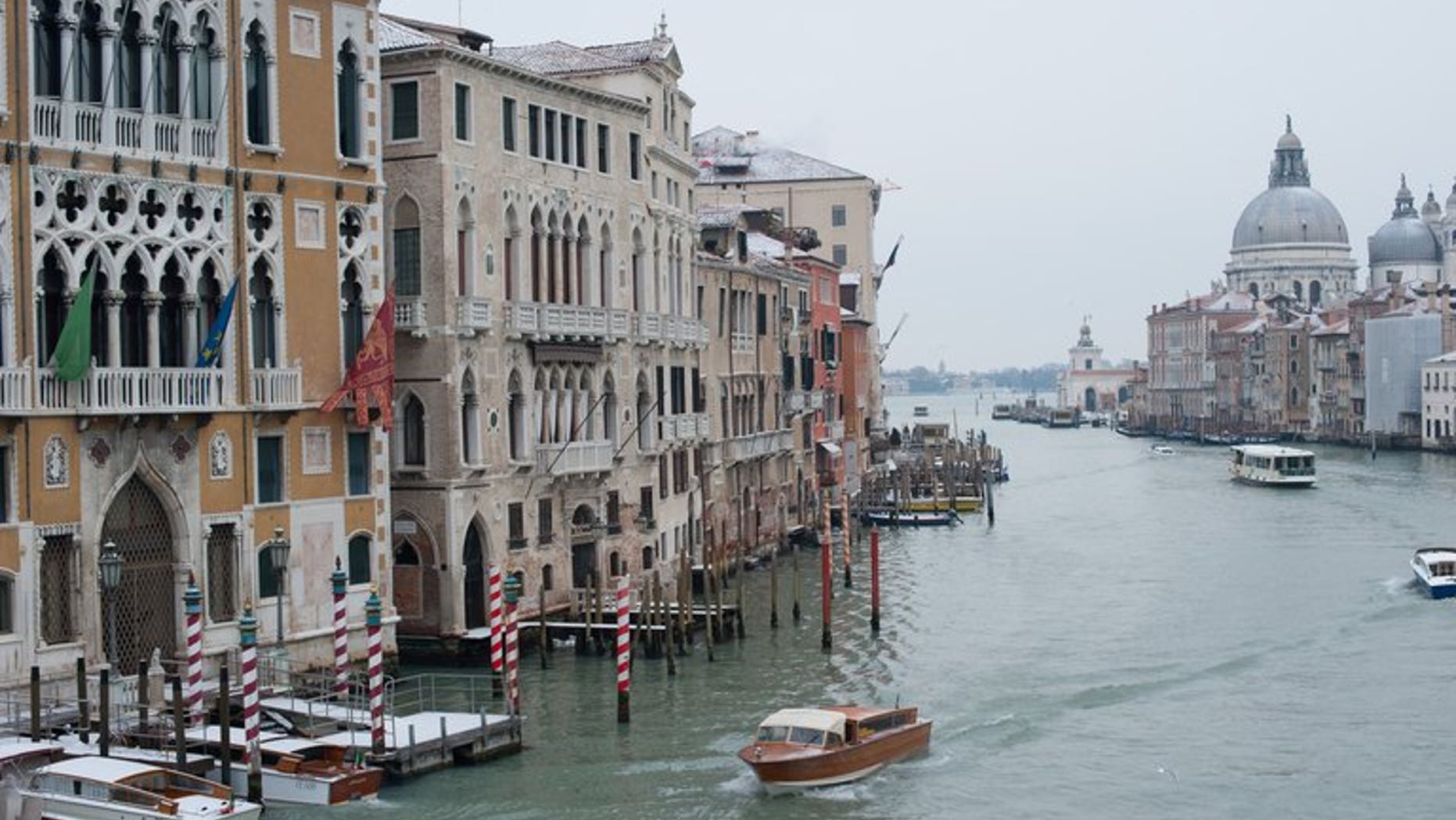 A picture taken on February 12, 2012 shows boats sailing on the Grand Canal in Venice. A gondola and a vaporetto waterbus collided Saturday on Venice's Grand Canal, killing a German tourist and badly injuring a young girl, Italy's Ansa news agency reported.