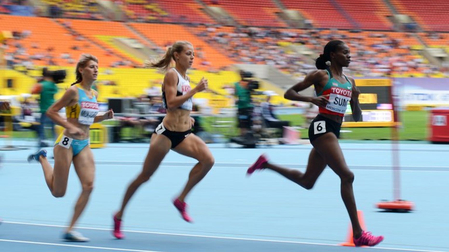 Eunice Sum (right) runs in the World Championships women's 800 metres heats in Moscow on August 15. The 25-year-old Kenyan timed 1min 57.38sec with Russia's defending champion Mariya Savinova taking silver (1:57.80) and Brenda Martinez of the United States the bronze (1:57.91).