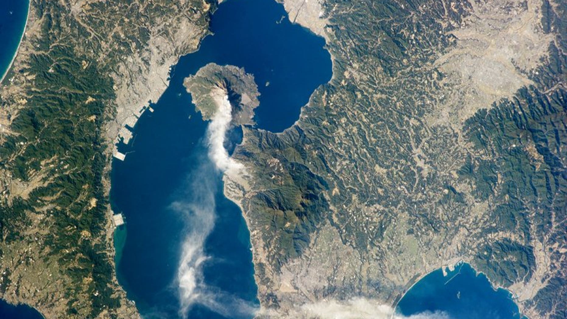 This image provided January 28, 2013 by NASA shows Japan???s Sakurajima volcano. The volcano in southern Japan erupted in spectacular fashion on Sunday, spewing an ash plume up to 5,000 metres into the air, meteorological officials said, according to a report.