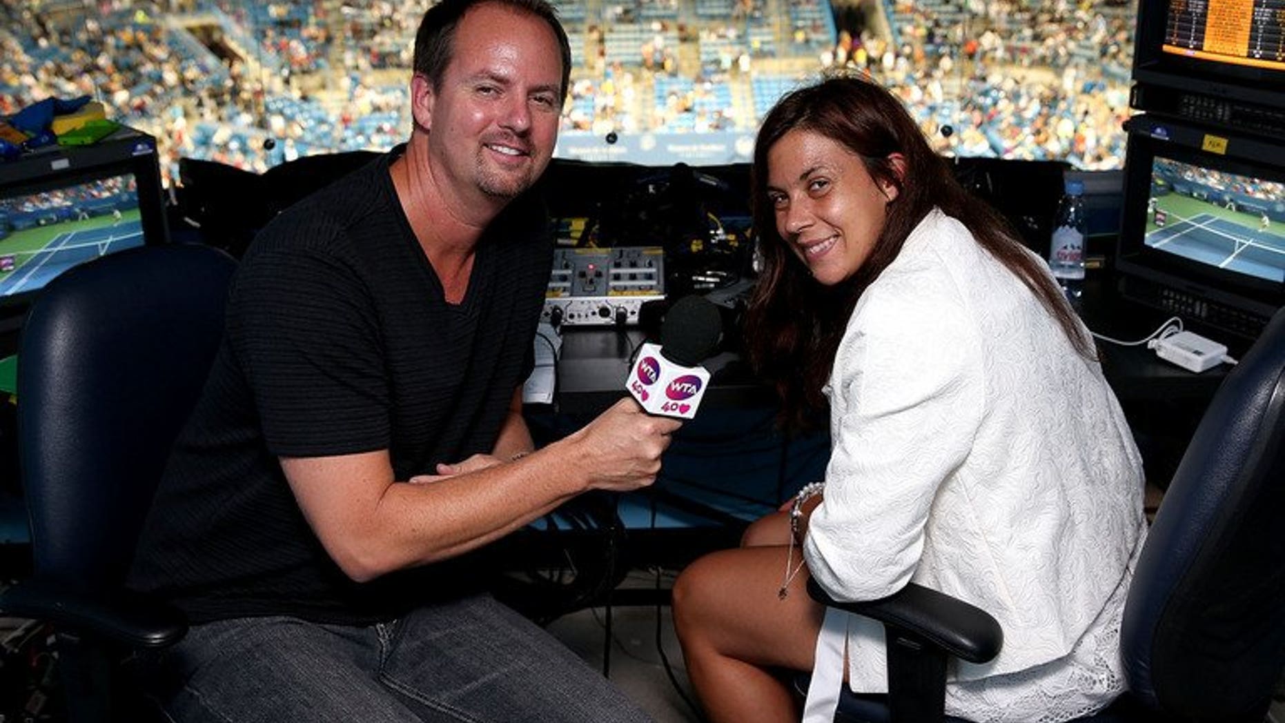 Kevin Skinner is visited by Marion Bartoli on August 16, 2013 at Lindner Family Tennis Center in Cincinnati, Ohio. Bartoli, who shocked tennis by announcing her retirement last week, revealed her new job on Sunday -- as a TV pundit.