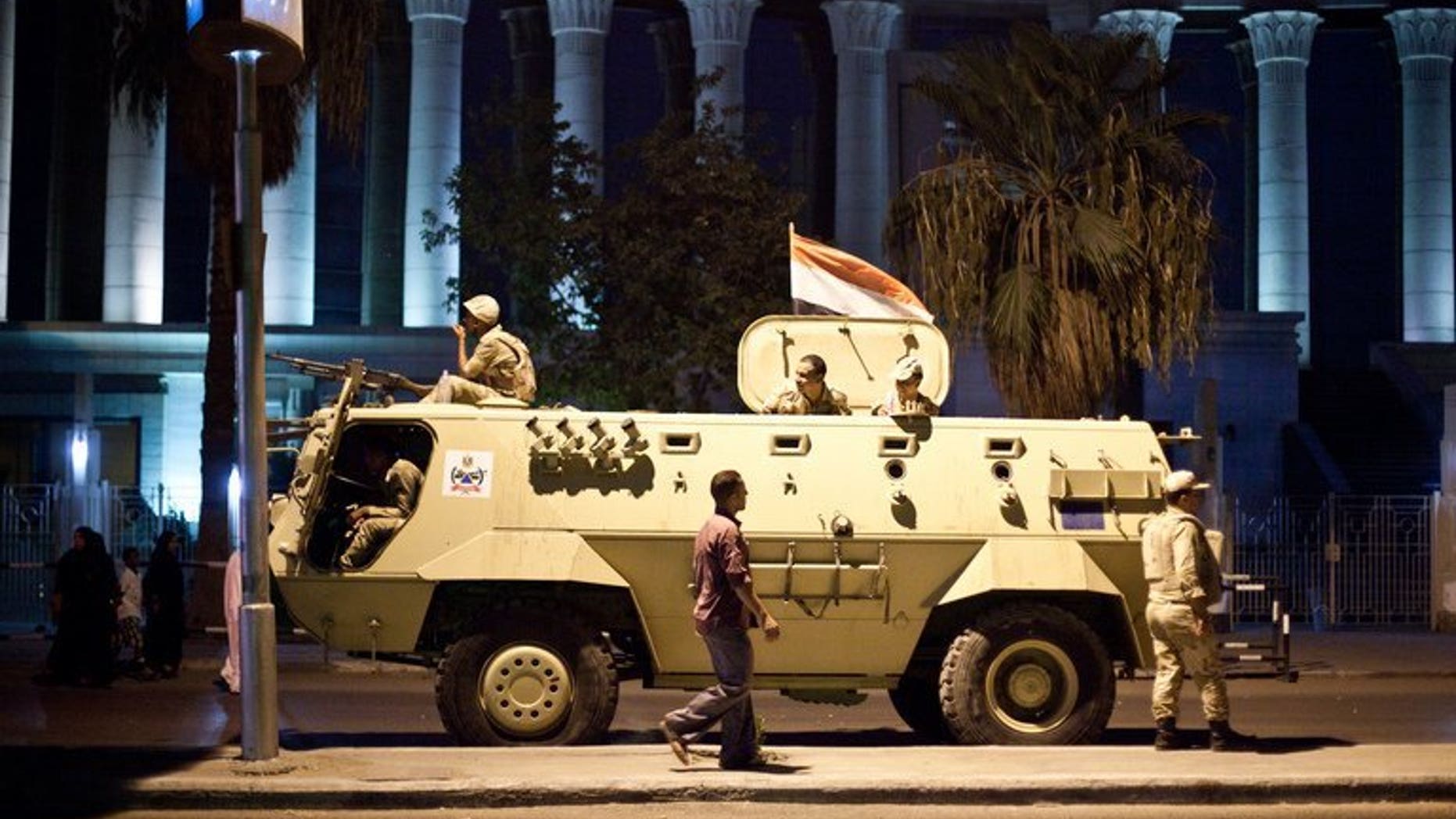 An Egyptian army armoured vehicle pictured in front of the Supreme Constitutional Court in Cairo ahead of planned demonstrations on August 18, 2013. Israel and the West must support Egypt's army, an Israeli official said Monday, after 24 Egyptian policemen were killed in an attack in the Sinai bordering the Jewish state.