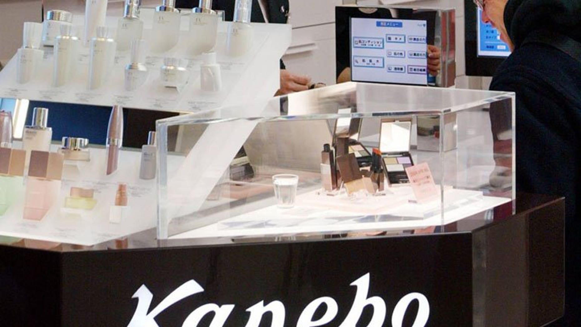 A Kanebo booth at a shop in Tokyo on January 31, 2004. Japanese cosmetics maker Kanebo said the number of complaints about skin discolouring from using its whitening products has topped 7,000 from customers both at home and abroad.