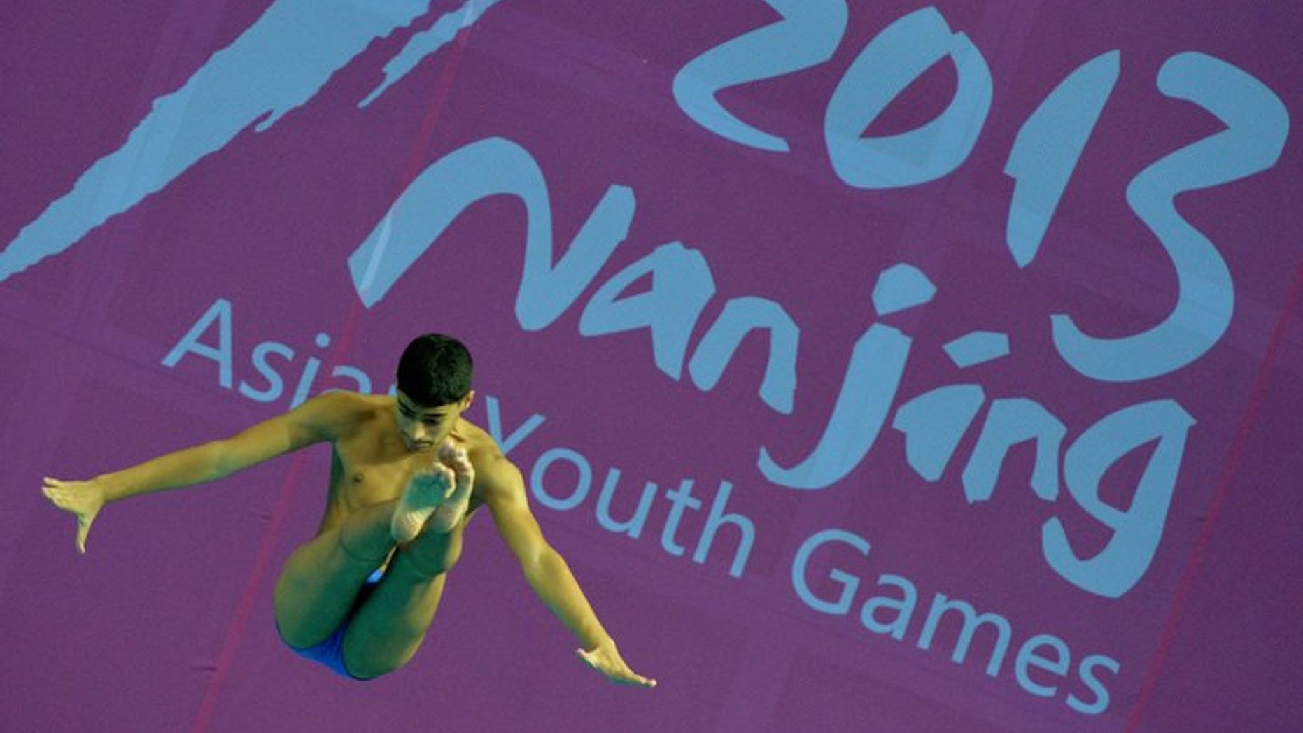 Hasan Qali of Kuwait competes in the 3m springboard at the Asian Youth Games in Nanjing on August 17. India's bungling sports officials were left red-faced on Monday after 17 track and field athletes were thrown out of the ongoing Asian Youth Games in Nanjing, China for being over-aged.