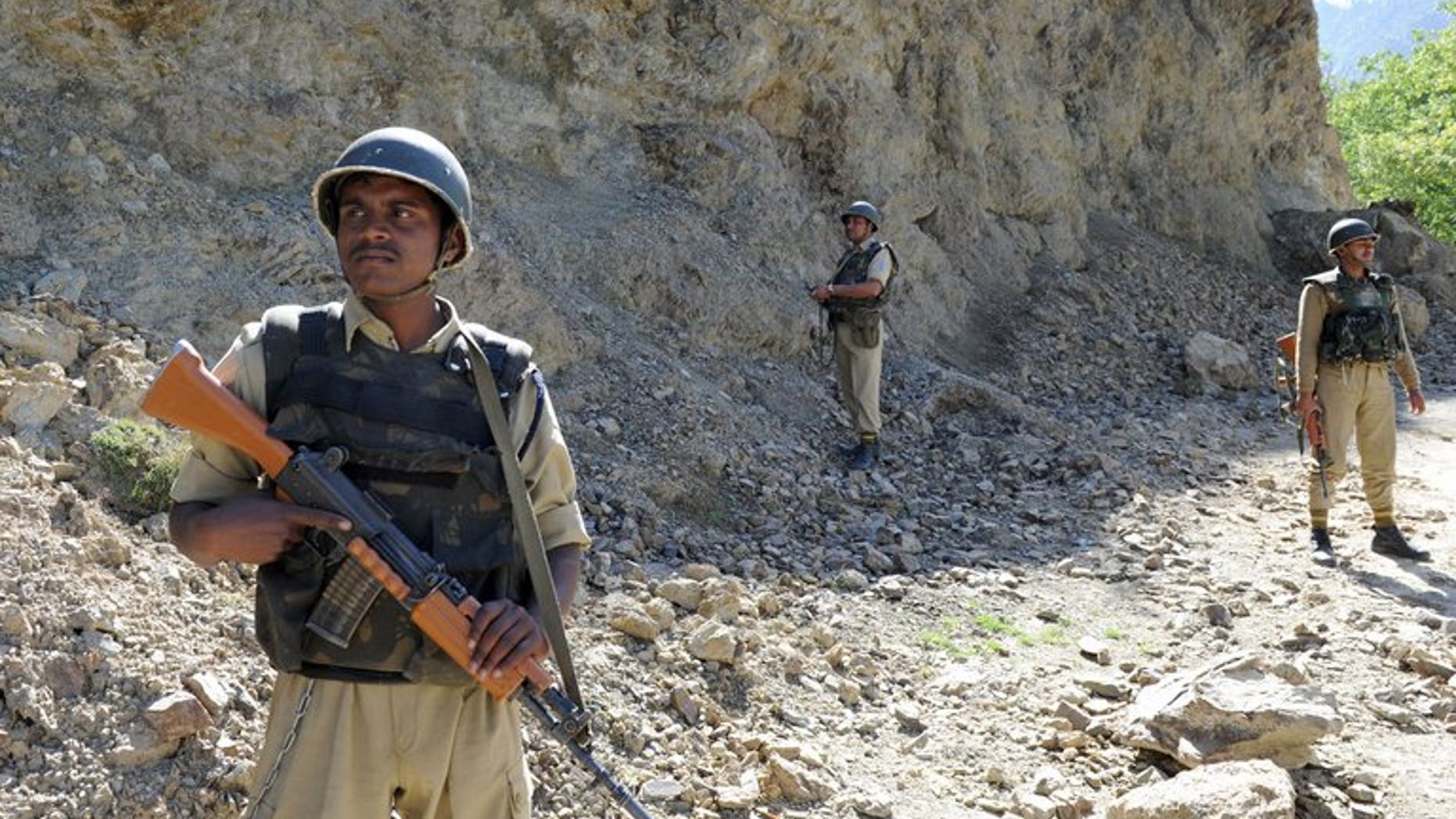 Indian security forces stand guard near the Line of Control (LOC) on May 13, 2009. India's army will take "all possible steps" to counter any ceasefire violations by Pakistan along the border between the countries, the Indian defence minister said Monday, warning not to take New Delhi's restraint for granted.