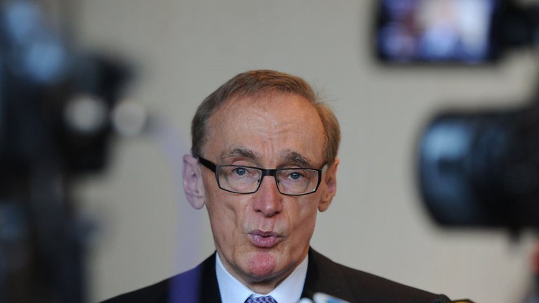 Australia's Foreign Minister Bob Carr speaks to the press after a luncheon in Hong Kong on July 26, 2013. Australian ministers will take part in regional talks in Indonesia on people-smuggling Tuesday in a fresh bid to tackle an issue that looms large at upcoming elections.