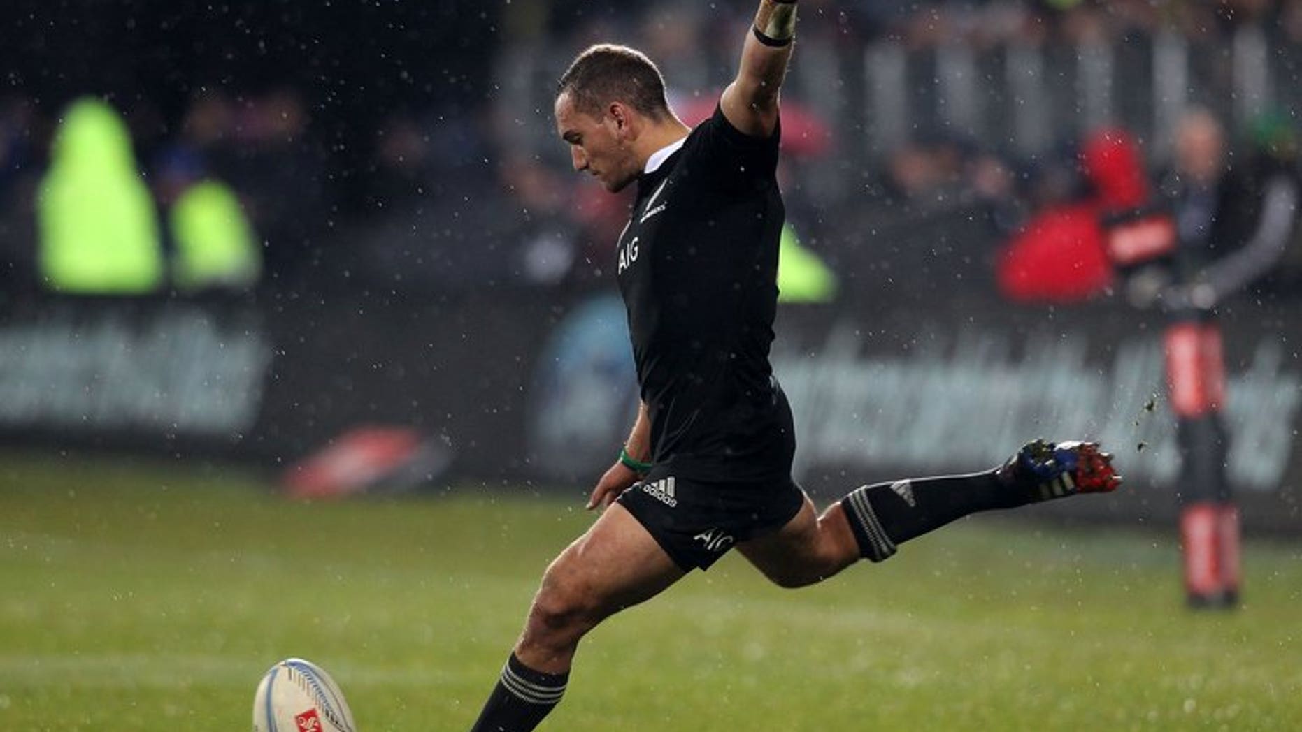 All Black Aaron Cruden of New Zealand, pictured kicking a penalty on June 15, 2013, will miss Saturday's clash with Australia. Also out are Beauden Barrett and Luke Romano.