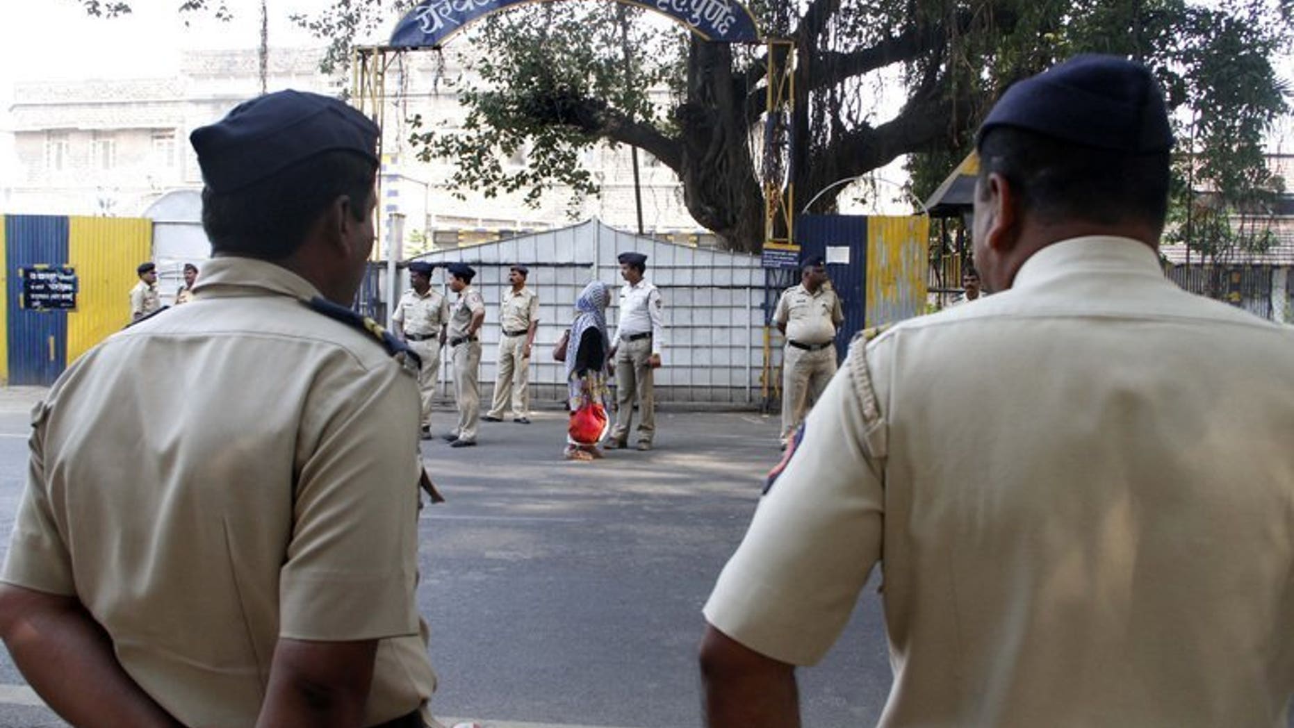 File picture shows police outside the high-security Yerwada Jail in Pune, western India, on November 21, 2012. A leading Indian rationalist, who was campaigning for a law to eradicate superstition in a country famed for its mystics and gurus, was shot dead in Pune on Tuesday, police said.