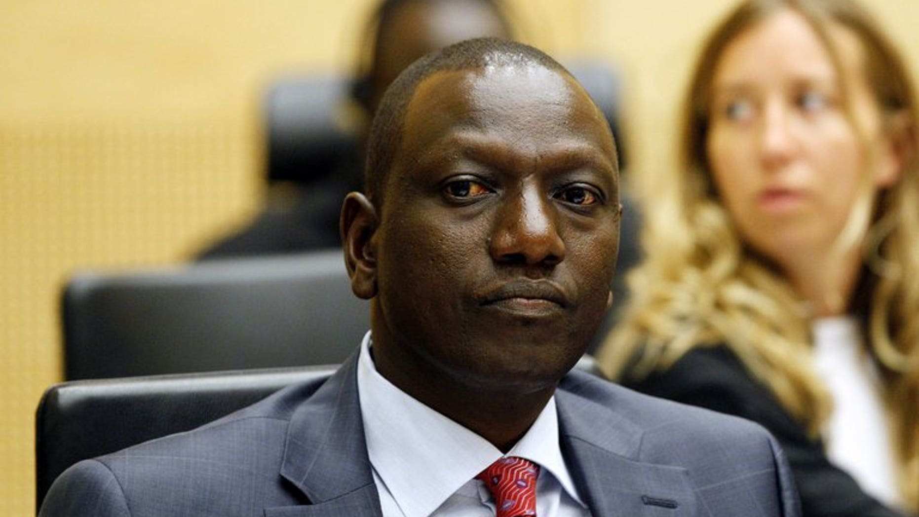 Former Kenyan Education Minister William Ruto sits in the courtroom of the International Criminal Court in The Hague on September 1, 2011. The ICC has suspended a decision allowing Ruto to be absent from parts of his trial next month for crimes against humanity.
