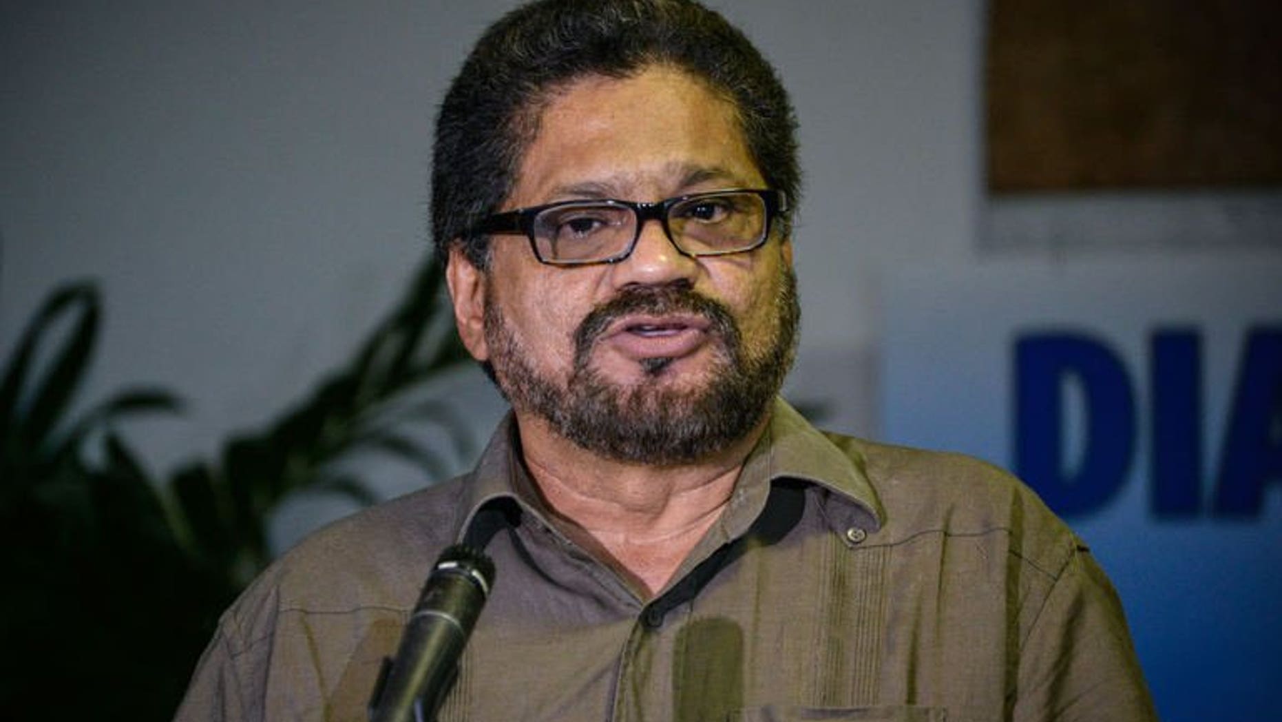 Revolutionary Armed Forces of Colombia (FARC) Commander, Ivan Marquez, gives a speech at the Convention Palace in Havana as peace talks with the Colombian government resume on August 19, 2013. The FARC guerrilla group for the first time accepted partial responsibility Tuesday for the thousands of victims of Colombia's nearly 50-year-old insurgency.