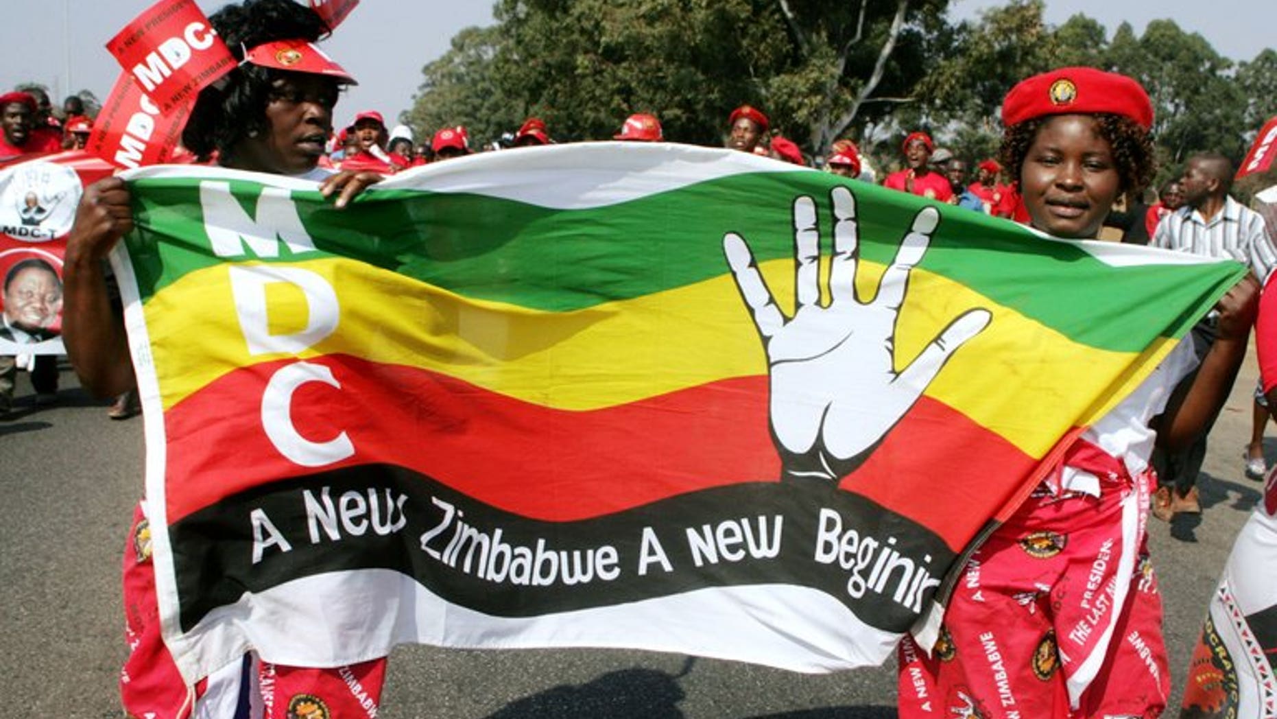Mourners at the August 14 funeral of Morgan Tsvangirai supporter Rebecca Mafikeni, who died in custody. Zimbabwean opposition leader Tsvangirai will not attend President Robert Mugabe's inauguration Thursday, aides said, insisting the vote which handed the 89-year-old another five-year term was rigged.