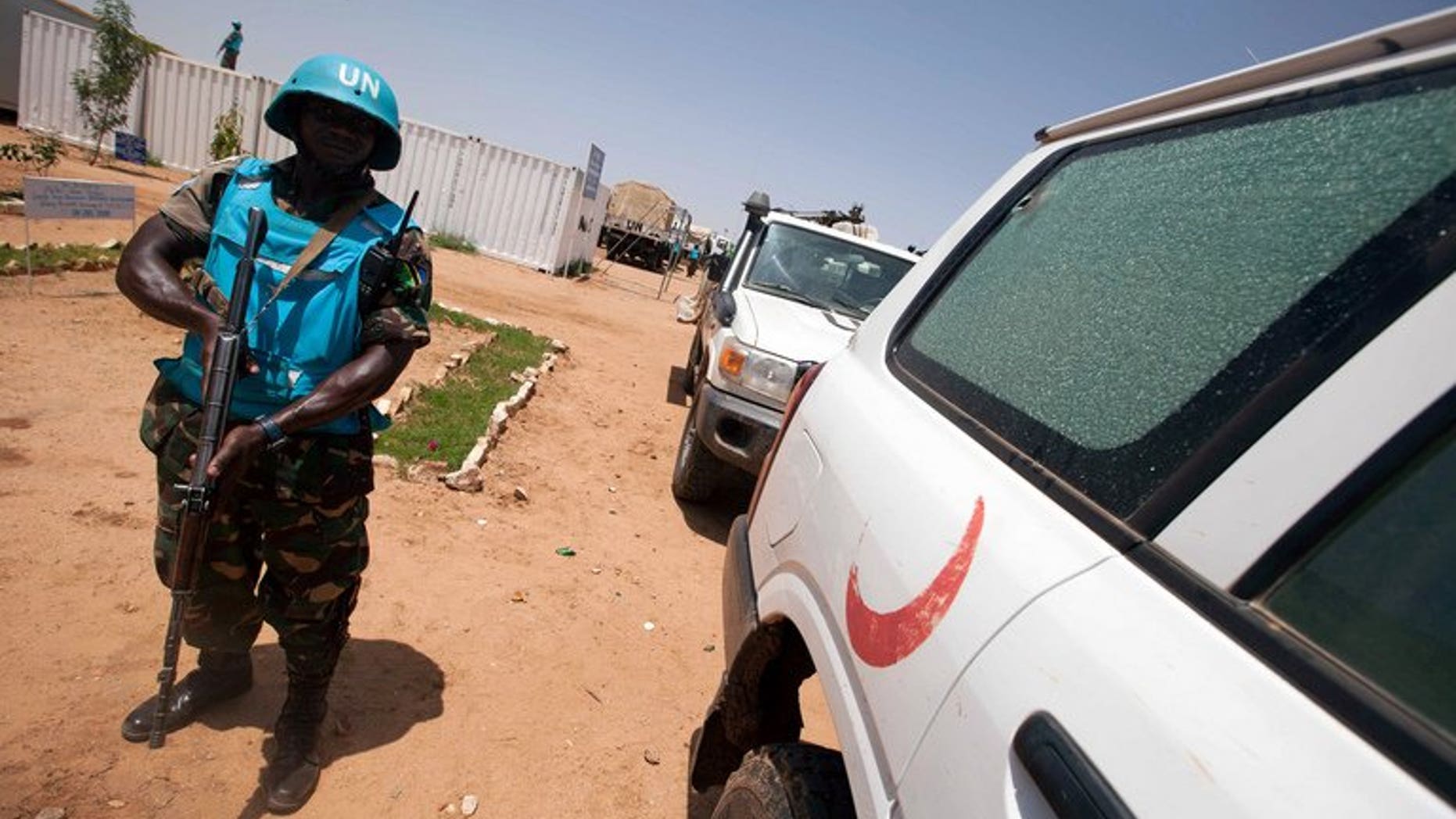 A UNAMID picture released on July 14 shows a military peacekeeper in Khor Abeche in South Darfur. Twenty-four people have been freed, four days after being abducted by a rival tribe in Sudan's Darfur region following deadly clashes between the two groups, official media said Wednesday.