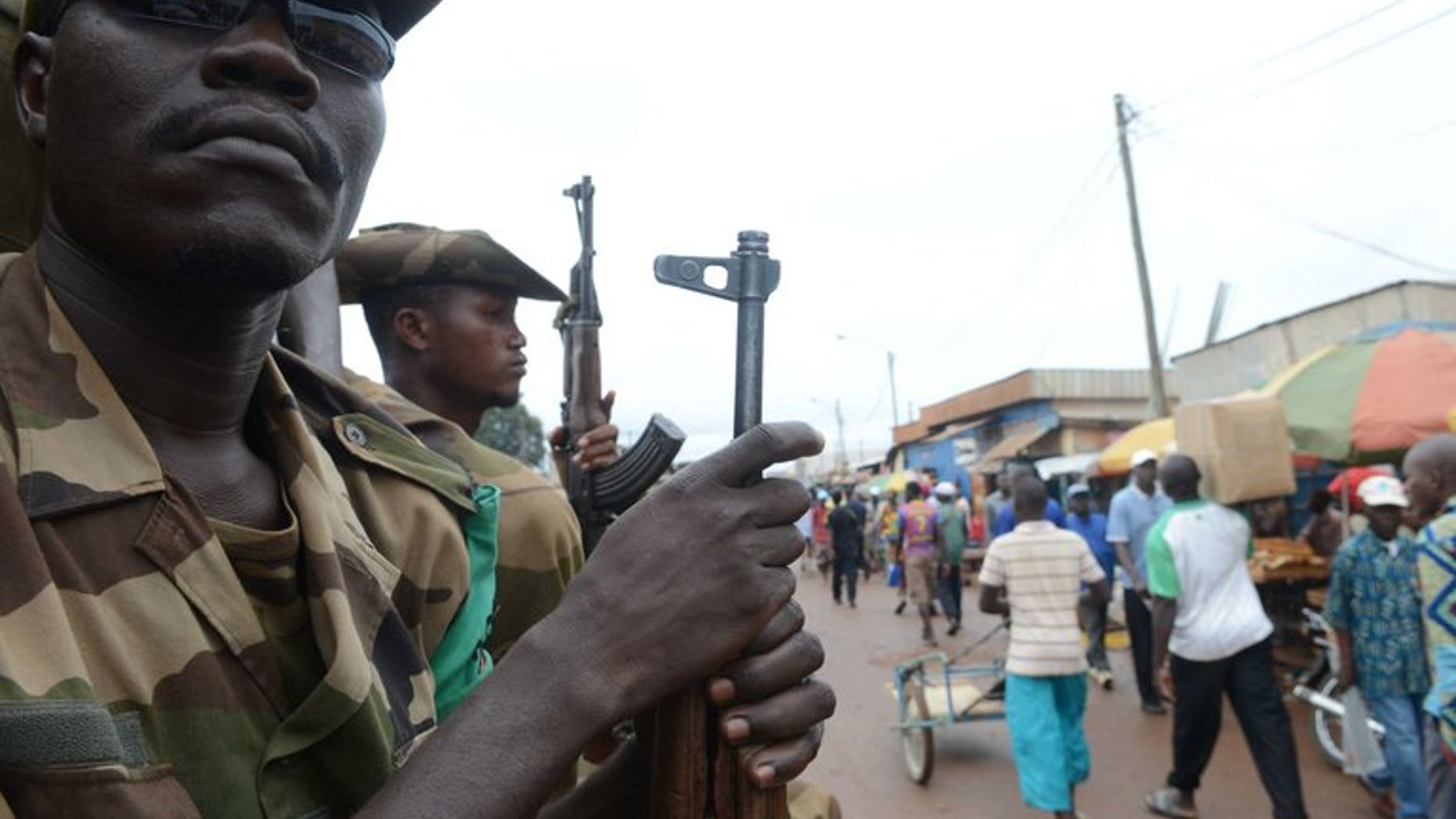 Members of the Multinational Force of Central Africa patrol on July 20 in Bangui. Armed clashes erupted in Bangui as the new president's forces tried to disarm supporters of former leader Francois Bozize, a military source said on Wednesday.