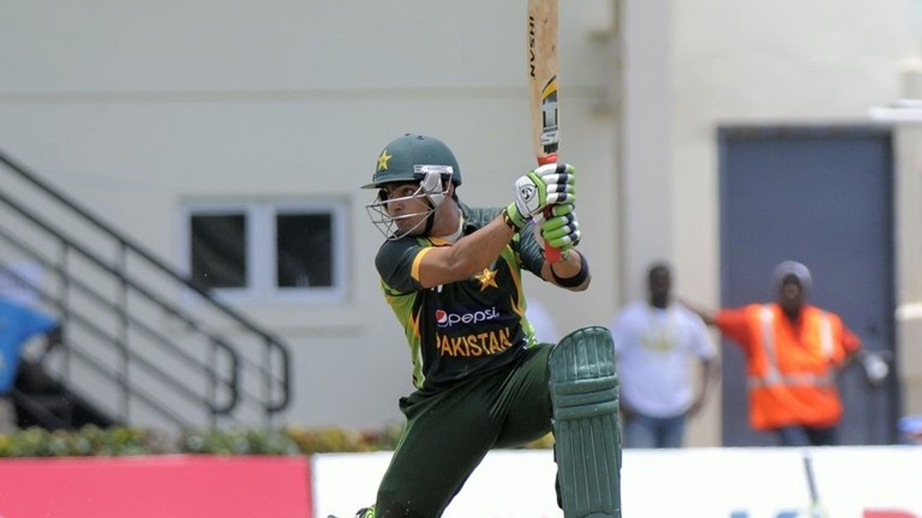 Pakistan batsman Umar Akmal in action at Beausejour Cricket Ground in Gros Islet on July 19, 2013. Pakistan's talented young batsman Akmal will see a neurologist for further testing after suffering a suspected seizure which forced his withdrawal from the Zimbabwe tour, an official said Wednesday.