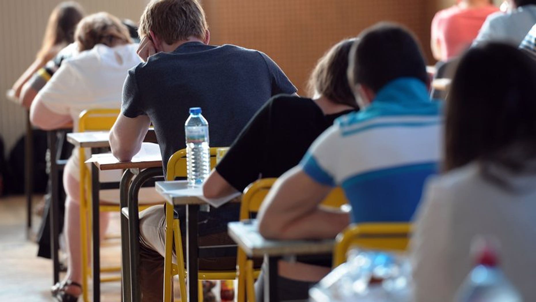 Illustration. Around 600,000 teenagers will receive their GCSE grades on Thursday with a second consecutive fall in the number of papers receiving top grades expected.