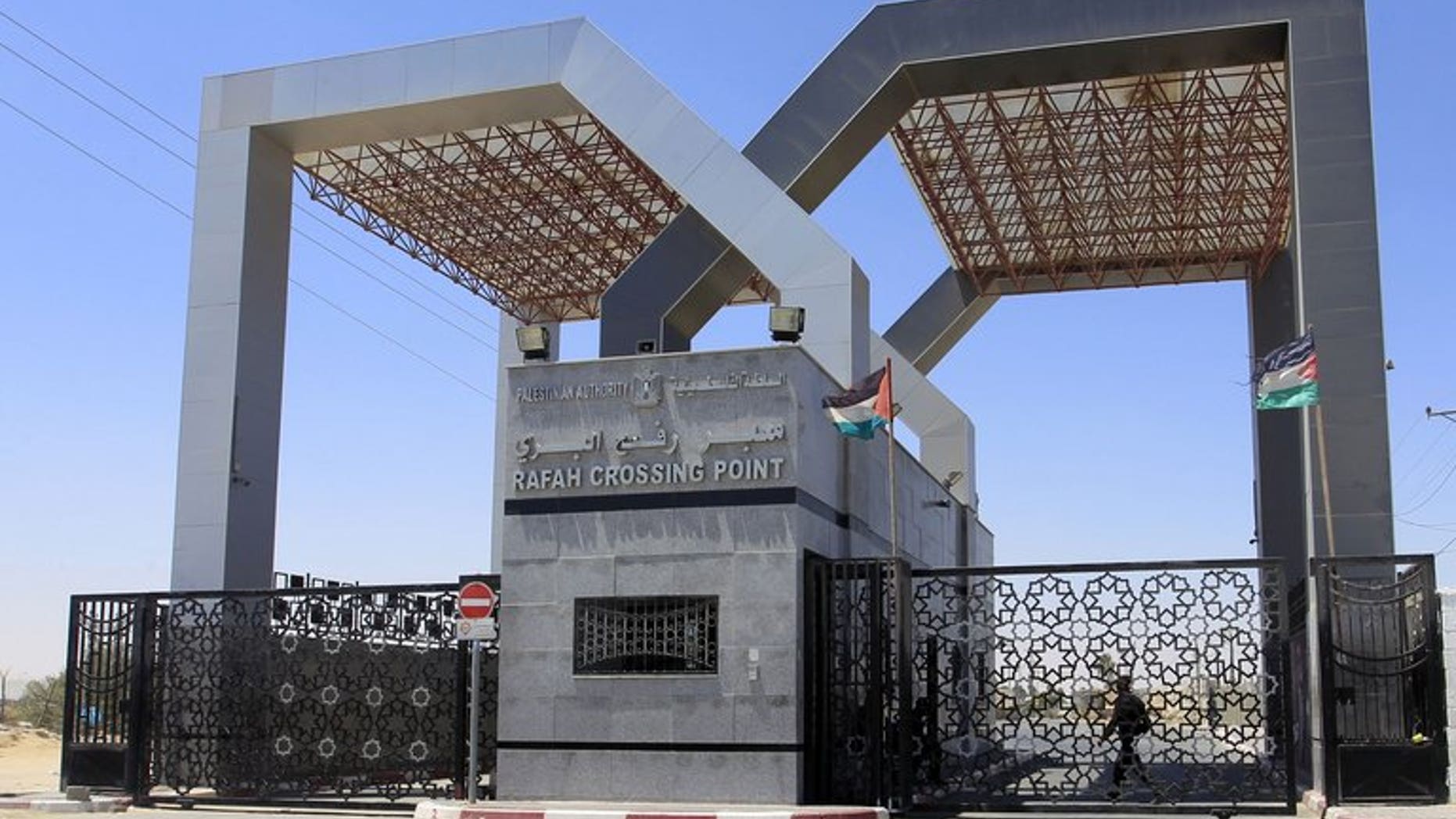 A picture shows the closed gates of the Rafah crossing point with Egypt in the southern Gaza Strip on July 5, 2013. Egypt is set to reopen the Rafah crossing, a Hamas official said on Thursday, a week after Cairo closed down the Gaza Strip's only land passage that bypasses Israel.
