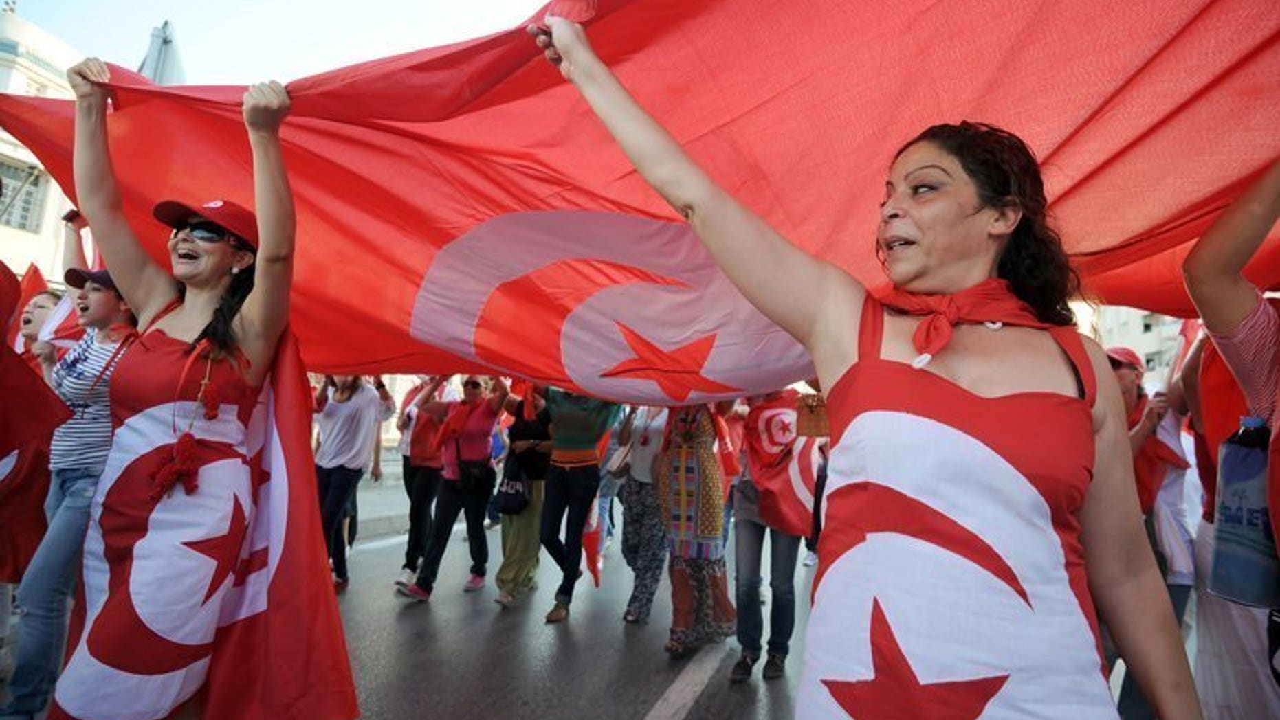 Demonstrators shout slogans during a protest in Tunis on August 13 against the country's Islamist-led government . Tunisia's opposition coalition on Friday rejected proposals by the ruling Islamists for ending a month-long political crisis, saying its offer to enter talks on a government of technocrats was insufficient.