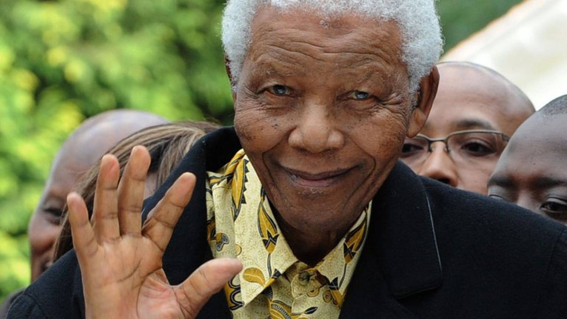 South African former President Nelson Mandela waves as he arrives at a polling station in Johannesburg on April 22, 2009. Mandela is "unstable" at times but has shown "great resilience" as he remains in a critical condition in hospital, South Africa's presidency said Saturday.
