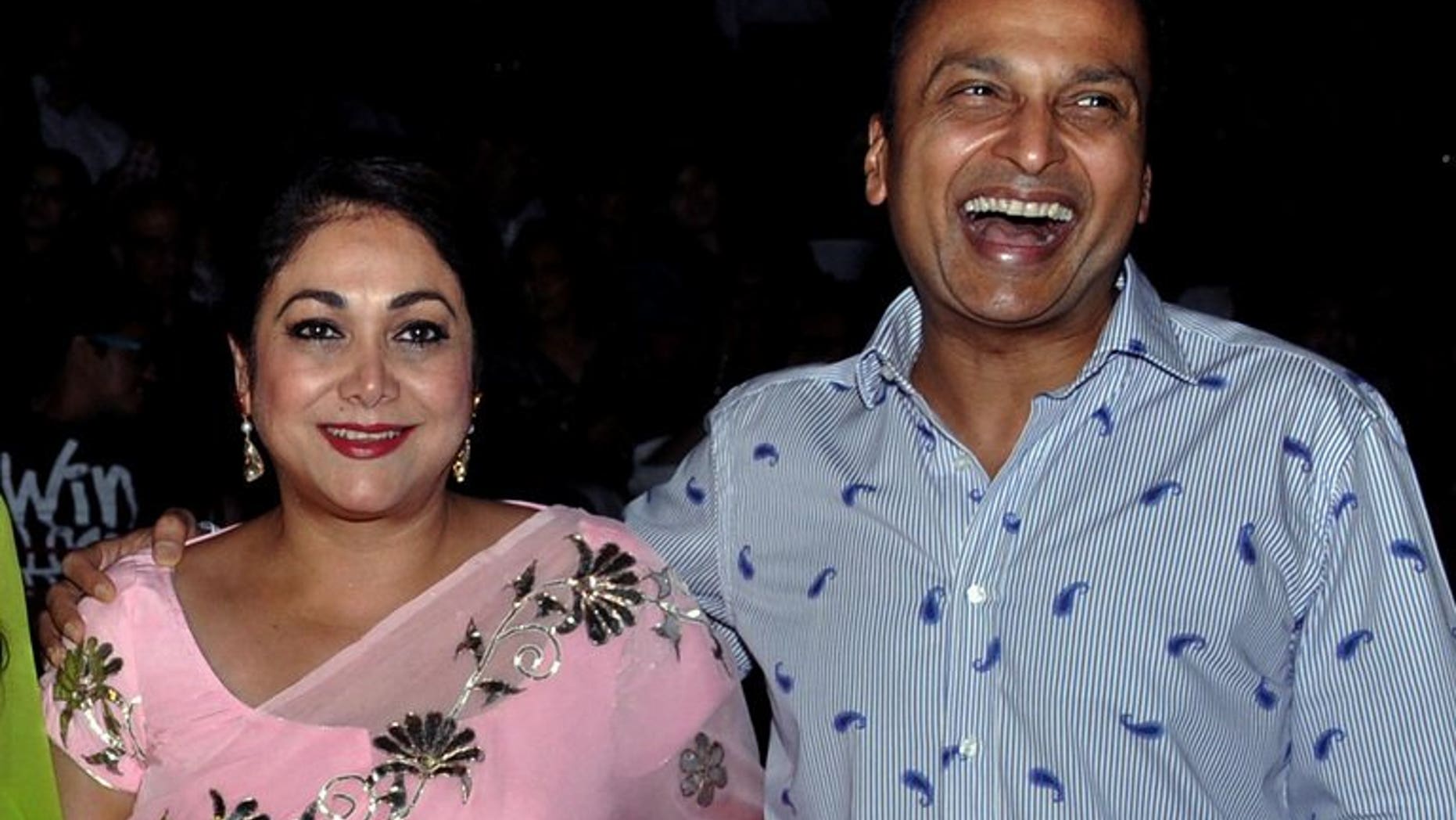 Indian socialite Tina Ambani (L) and industrialist Anil Ambani, seen in Mumbai on October 18, 2012. The former Bollywood star has told a court hearing a massive corruption case that she had no knowledge of the companies allegedly involved as she is a "housewife".