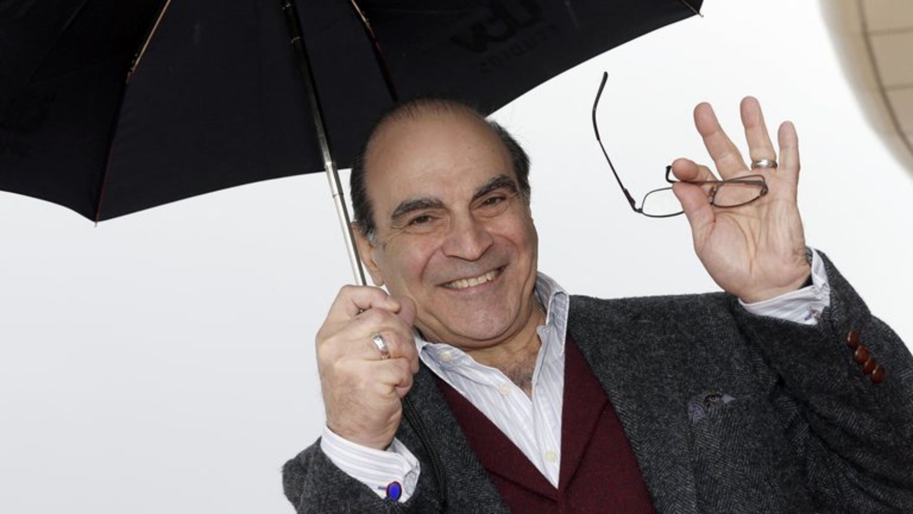 British actor David Suchet poses during the photocall of "Poirot" on April 8, 2013 in Cannes, southeastern France. Agatha Christie's mustachioed detective Hercule Poirot is to be resurrected in a new novel nearly 40 years after his last adventures.