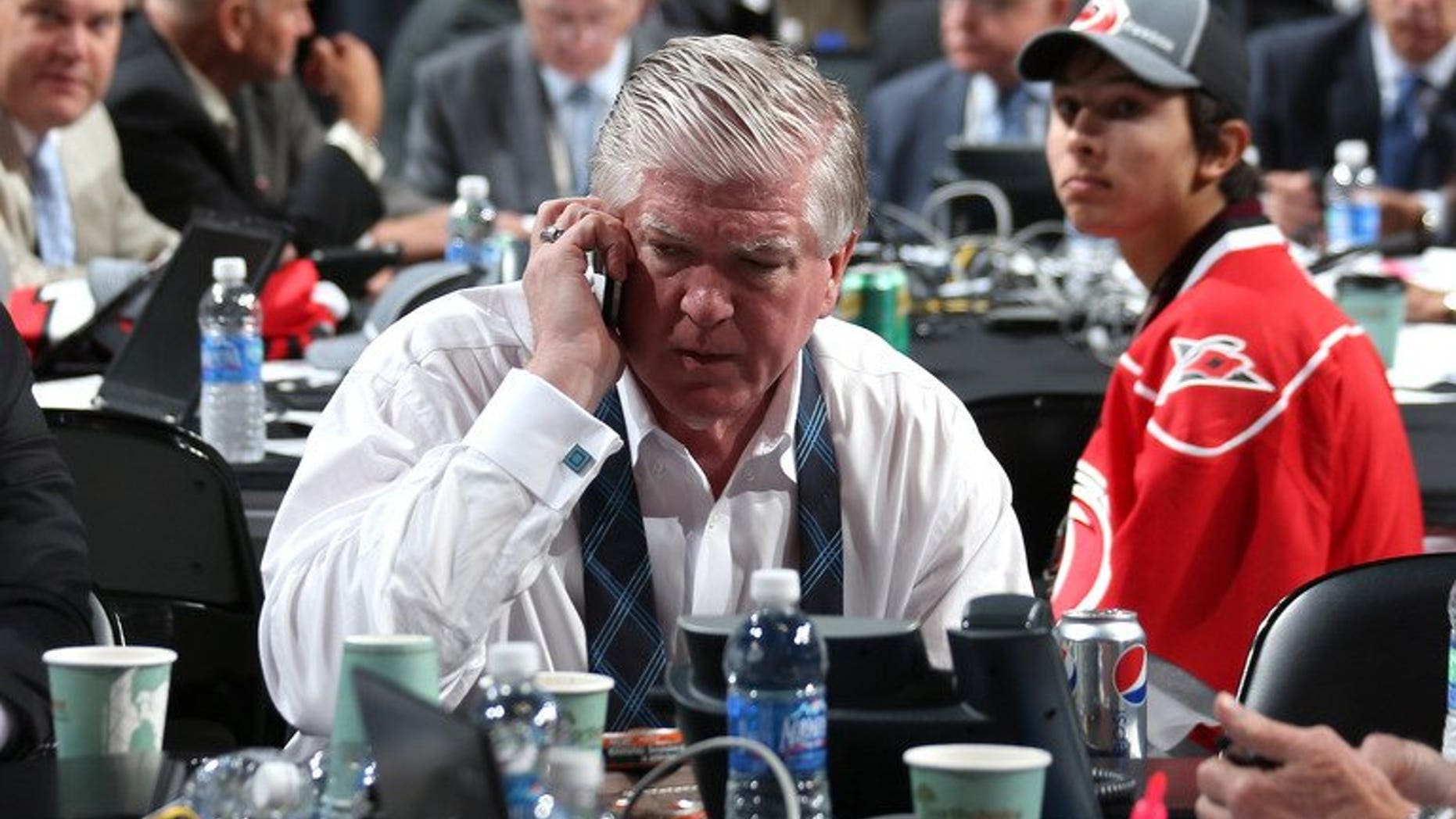 Then Toronto Maple Leafs General Manager Brian Burke, pictured at Consol Energy Center in Pittsburgh, Pennsylvania, on June 23, 2012. Burke, who helped assemble the 2007 Anaheim Ducks' Stanley Cup winning team, has been hired as the president of hockey operations for the Calgary Flames, according to the team.