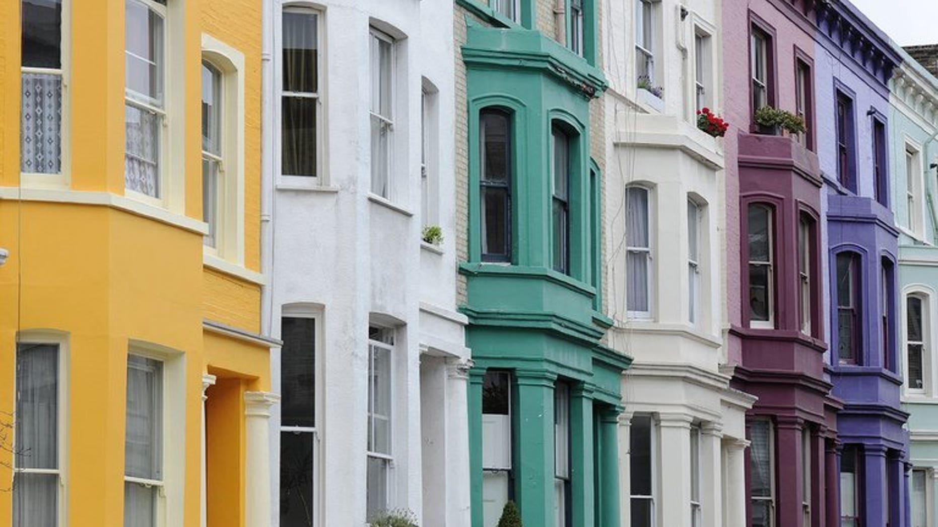 A row of terraced houses, pictured in west London, on August 30, 2011. British house prices rose in August for the seventh month in a row, as buyers returned to the market with the help of government-backed schemes, a survey shows.