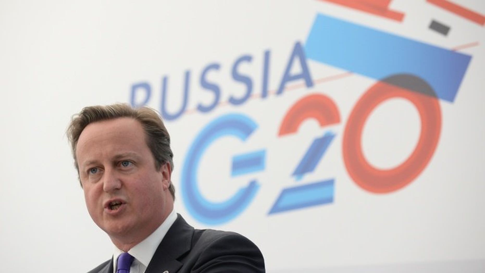 David Cameron gives a press conference at the G20 summit on September 6, 2013 in Saint Petersburg. The Prime Minister strongly defended Britain's achievements after a Russian official reportedly dismissed it as a "small island" with no international influence.