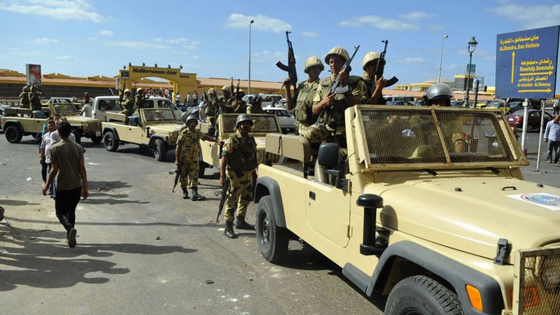 Egyptian soldiers are deployed in the streets of the Sidi Gaber neighbourhood of the northern city of Alexandria, on September 6, 2013. Thousands of supporters of ousted Egyptian president Mohamed Morsi have turned out for protests in Cairo after Friday prayers, despite a sustained crackdown on Islamists by the country's new authorities.