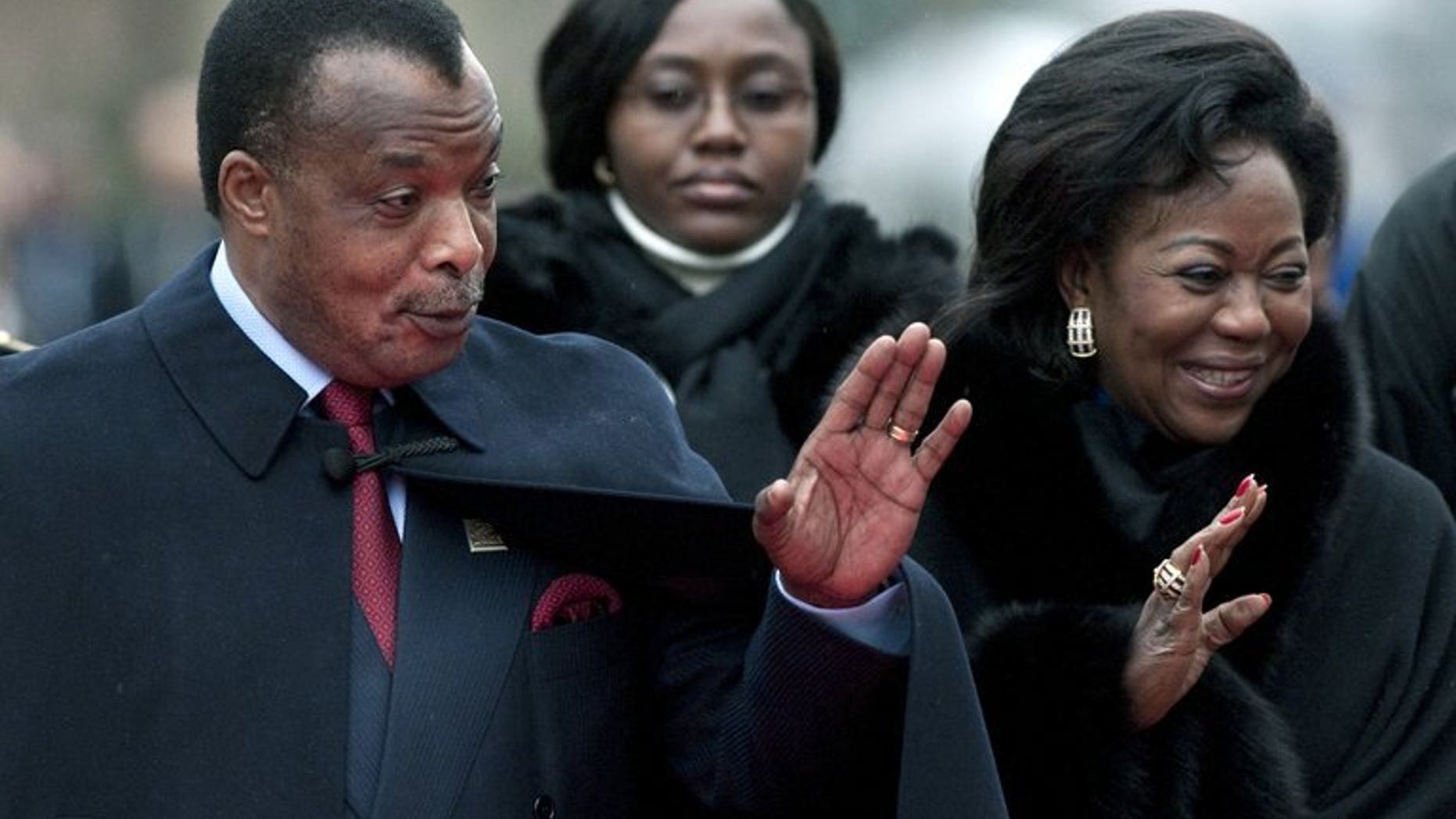 Republic of Congo President Denis Sassou Nguesso and his wife, Antoinette, arrive at a ceremony on October 23, 2010 in Montreux. Congo's president has made an impression on a small town in recession-hit Spain -- after relaxing at its thermal baths for a few days he left local residents 10,000 euros ($13,000).