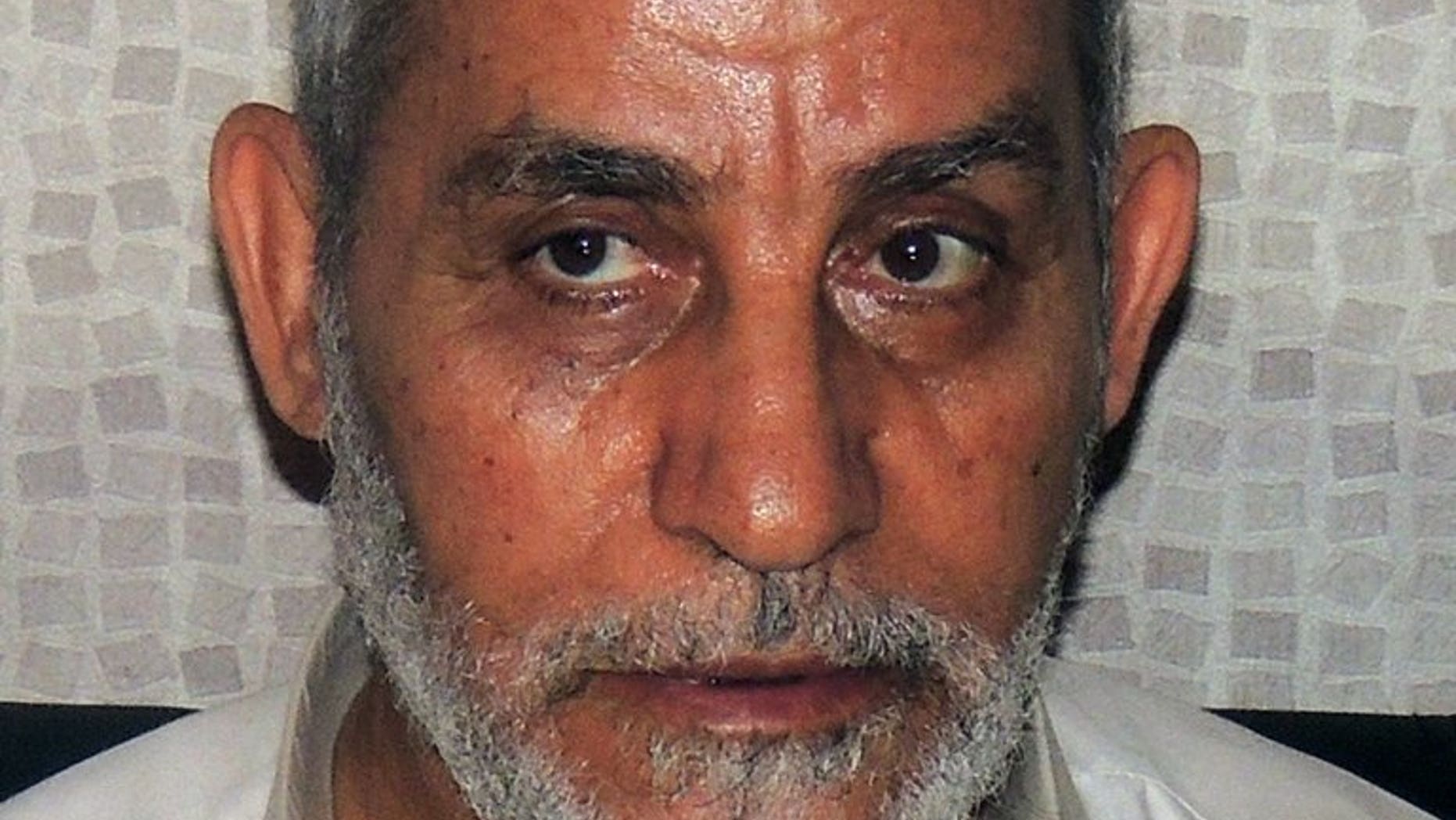Muslim Brotherhood leader Mohamed Badie shortly after his arrest in Cairo, on August 20, 2013. Egypt's state prosecutor has said Badie will stand trial in a second case over clashes in which several demonstrators were killed, according to judicial sources.
