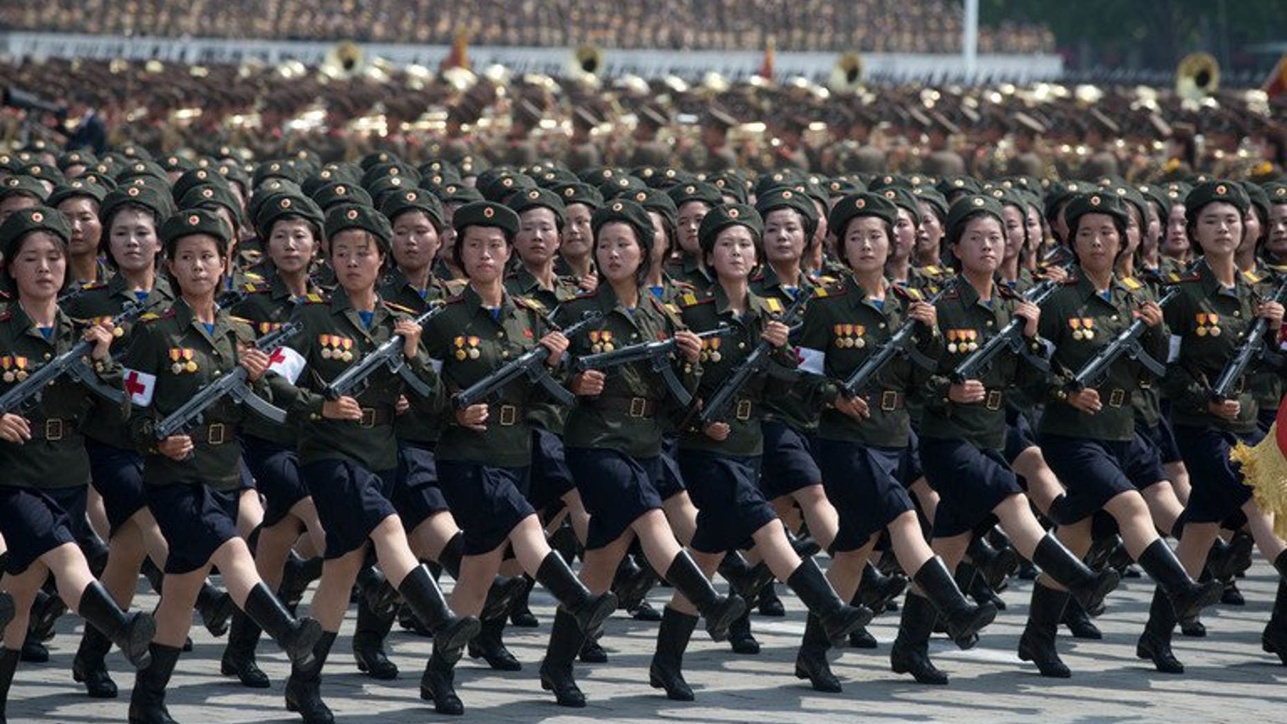 North Korean soldiers march during a military parade in Pyongyang on July 27, 2013. A second mass parade was held Monday.