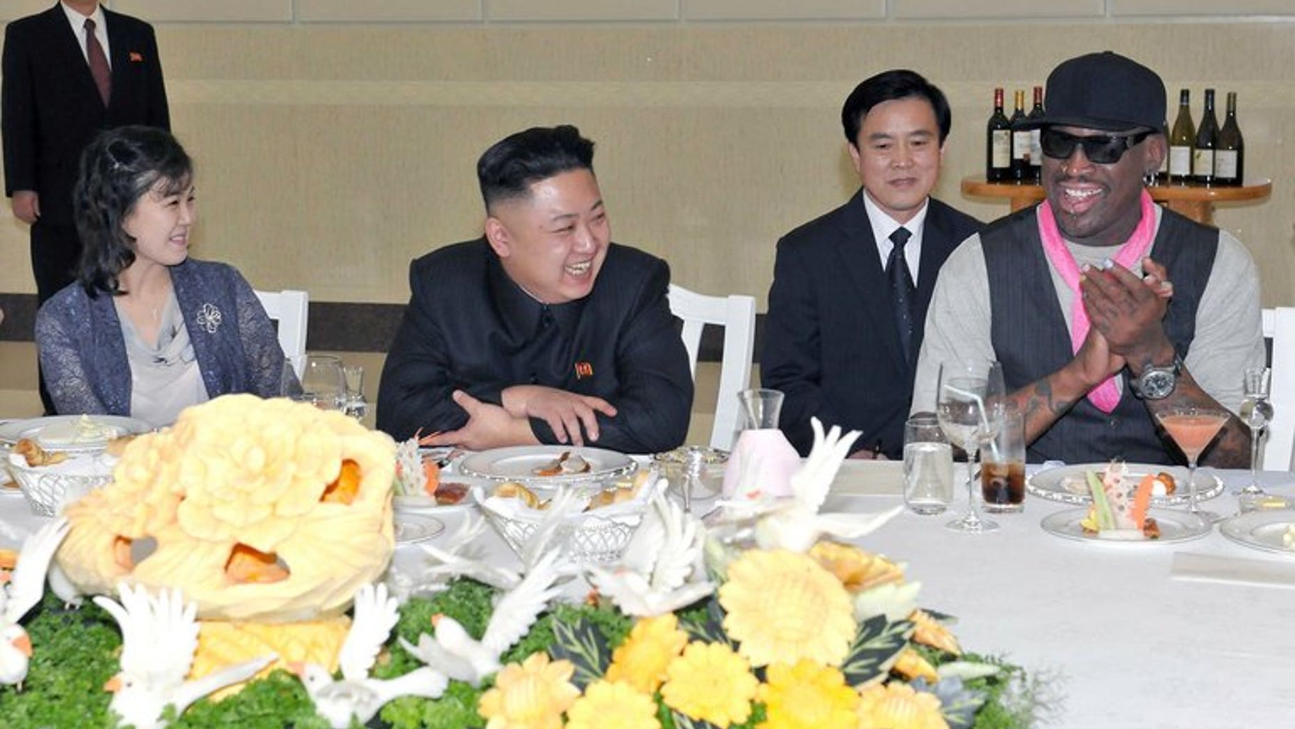 Kim Jong-Un, his wife Ri Sol-Ju and former NBA star Dennis Rodman during a dinner in Pyongyang on February 28, 2013. Rodman told the Guardian newspaper that Kim's daughter was named Ju-Ae.