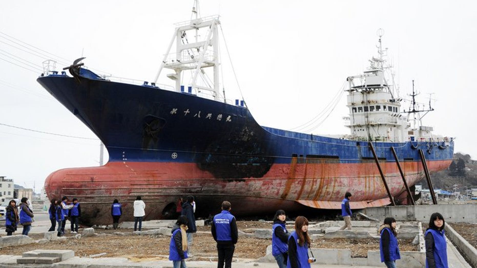 The 330-ton fishing vessel Kyotoku Maru No. 18., pictured on March 8, 2012. On Monday workers started to dismantle the ship, which was swept half a kilometre inland during the 2011 tsunami.