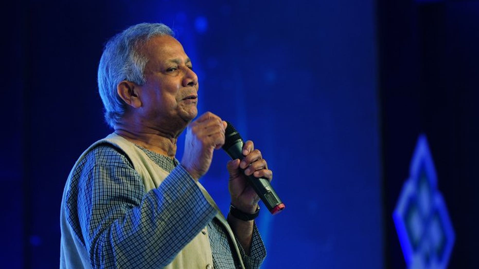 Nobel laureate Muhammad Yunus speaks during the Social Business Day in Dhaka on June 28, 2013. Bangladesh's cabinet has ordered "legal action" against 2006 Nobel Peace Prize winner Muhammad Yunus, accusing him of avoiding taxes on income from awards, book royalties and foreign tours.