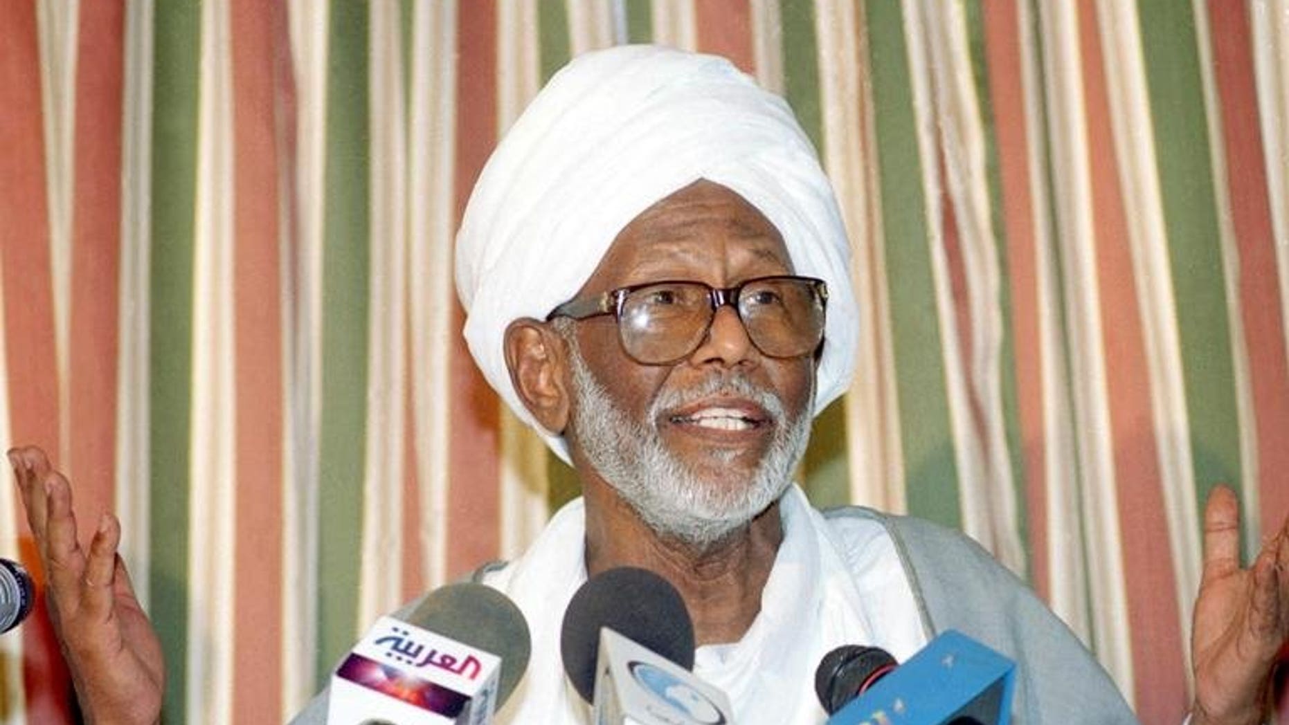 Sudan's Popular Congress Party (PCP) leader Hassan al-Turabi speaks during a press conference in Khartoum, on October 14, 2003. The PCP say that Yousef Mohammed Saleh Lebis -- who was jailed in connection with an alleged coup attempt in 2004 -- has been released by Sudanese authorities.