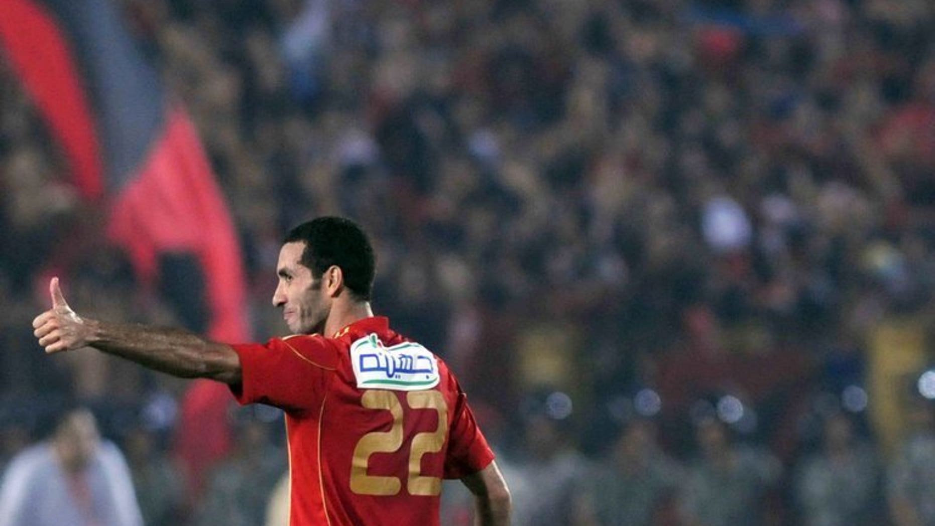 Mohamed Abou Trika scores in Cairo on September 16, 2011. Abou Trika celebrated his 100th cap by scoring one goal and creating three in a 4-2 World Cup qualifying win over 10-man Guinea