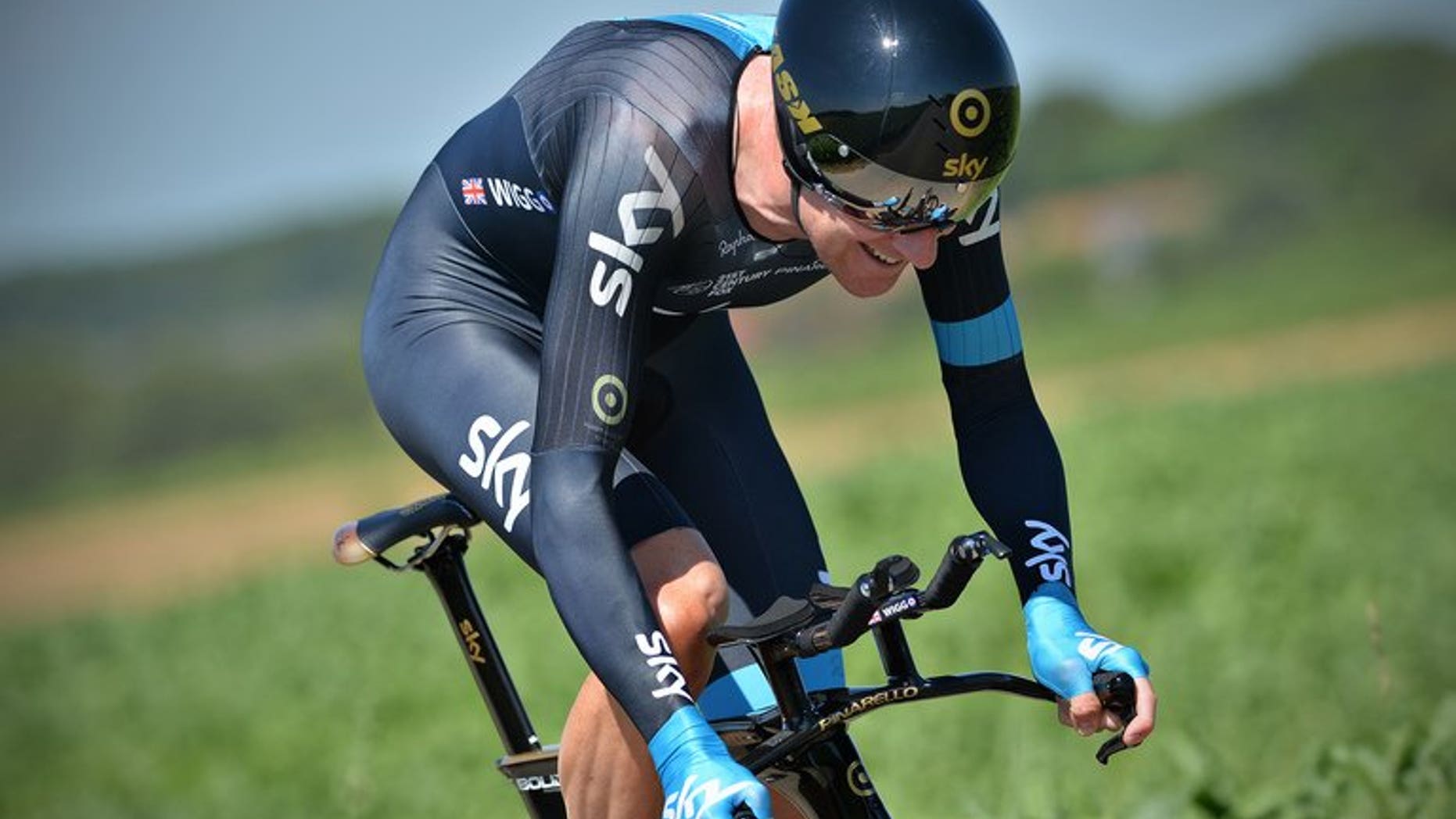Bradley Wiggins of Team Sky rides during the fifth stage of the Eneco Tour cycling race in the Netherlands on August 16, 2013. Tour de France 2012 champion Bradley Wiggins almost withdrew from the race in a row over team-mate Chris Froome, former Team Sky general manager Sean Yates said in extracts from his new book published on Thursday.