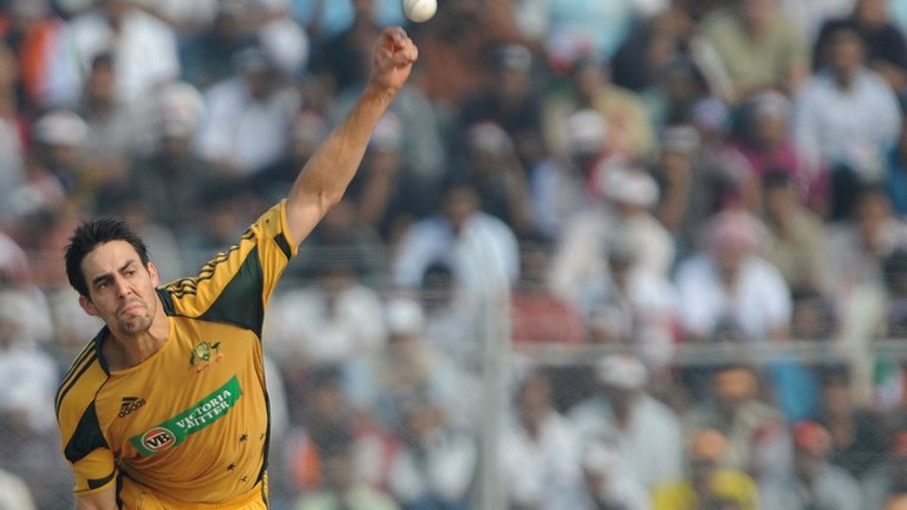 Australian bowler Mitchell Johnson delivers a ball during the sixth one-day international match between India and Australia at the Nehru Stadium in Guwahati on November 8, 2009.