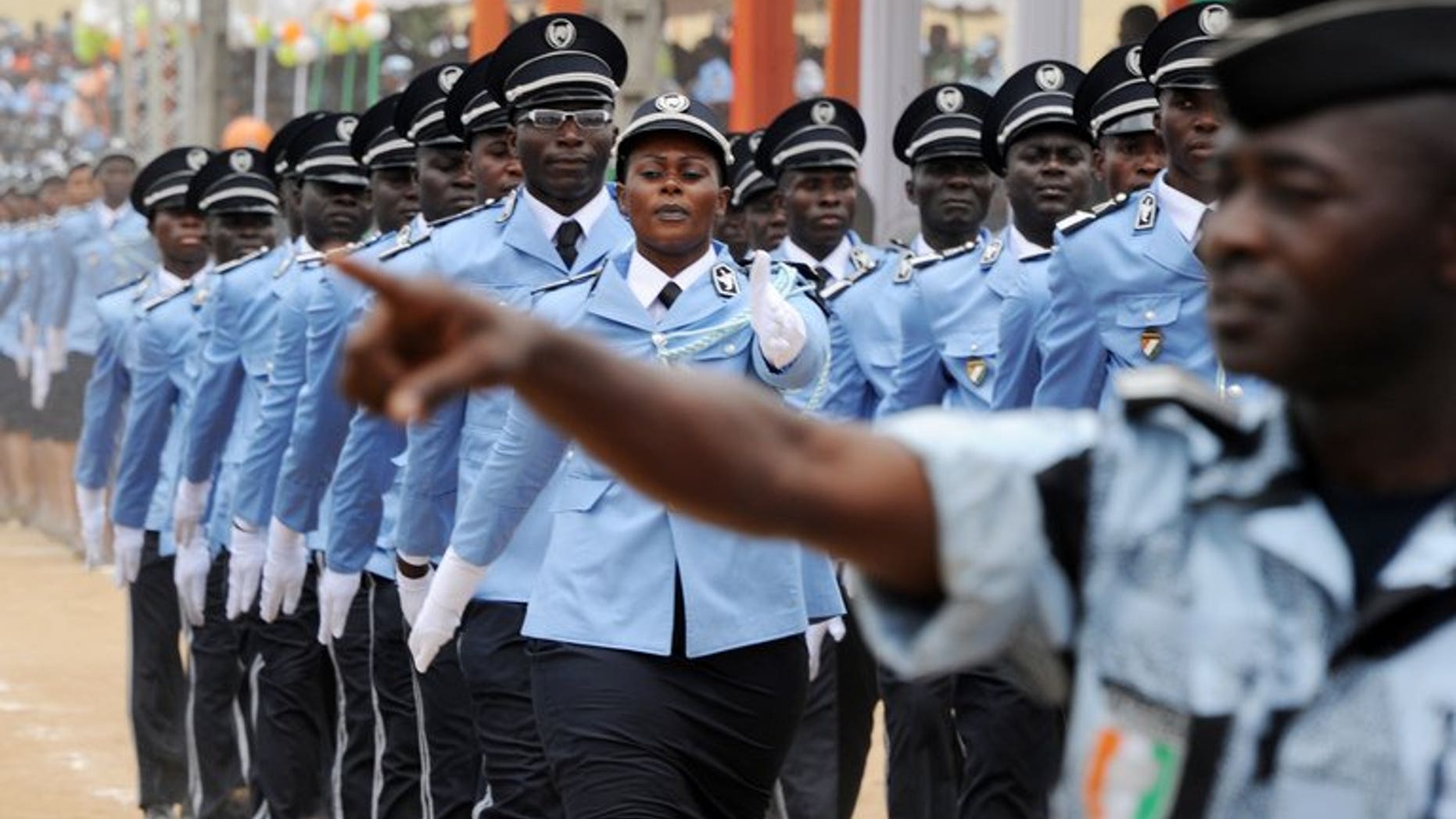 Ivorian police officers march during a graduation ceremony on September 28, 2012 in Abidjan. Three members of the Ivorian security forces have been killed in Yamoussoukro, the administrative capital of Ivory Coast, in two separate attacks by armed gangs, officials said.